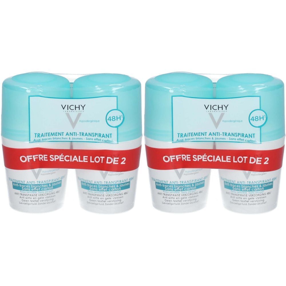 Deux déodorants roll-on emballés. Flacons bleu clair avec étiquette blanche et bande rouge. Texte: VICHY, 48H, Traitement Anti-Transpirant.