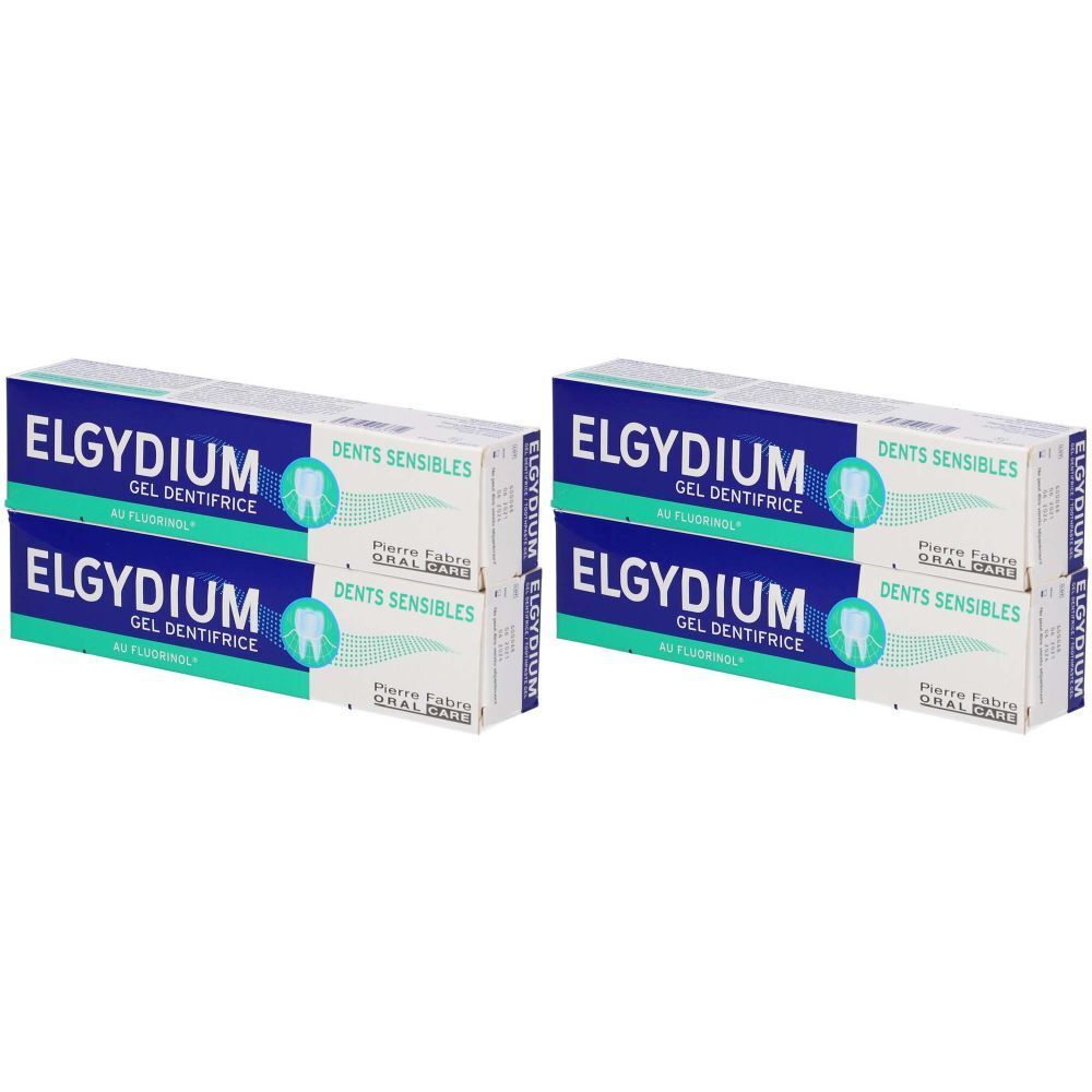 Mehrere Packungen Zahnpasta. Blaue und weiße Kartons mit der Aufschrift ELGYDIUM, Gel Dentifrice und Dents Sensibles.