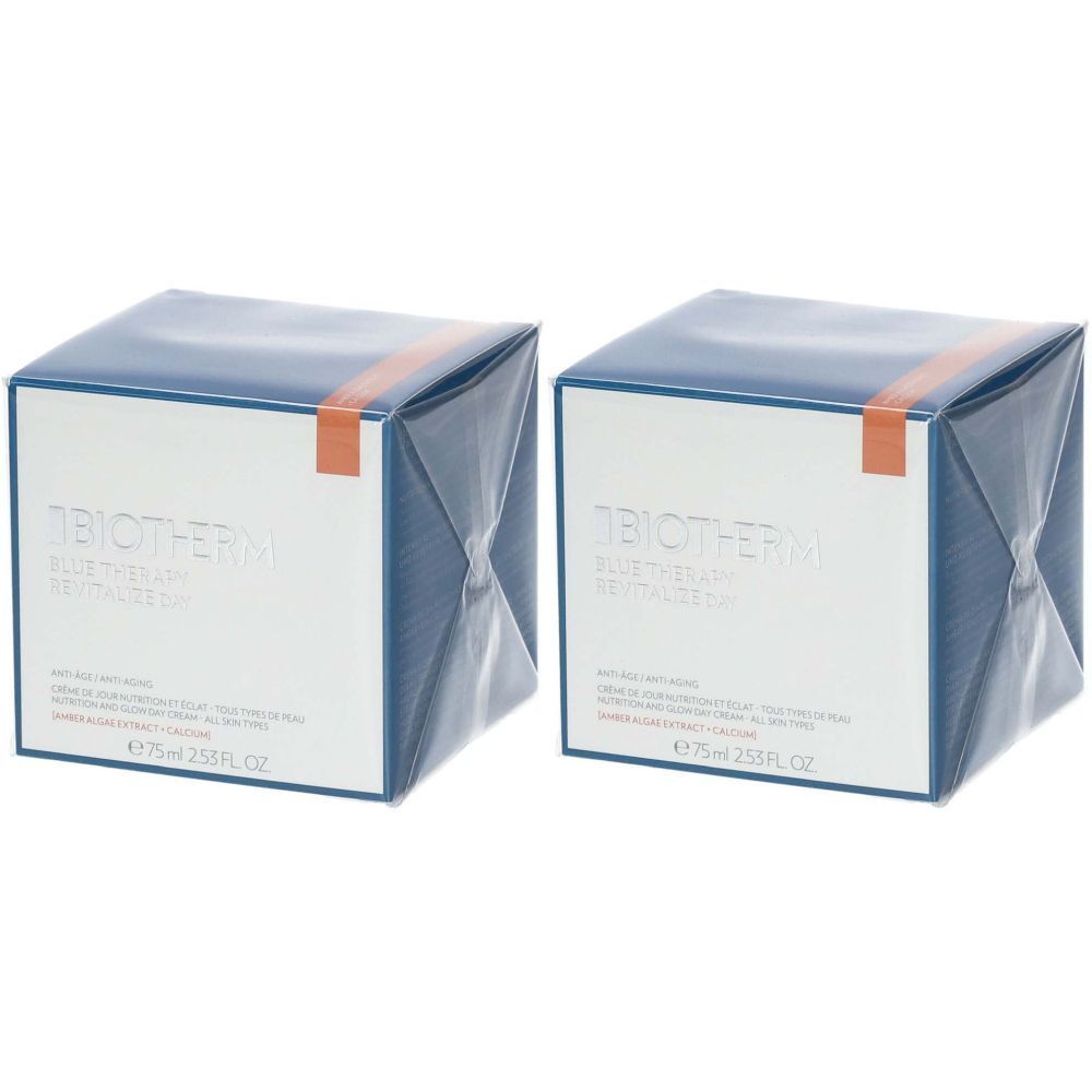 Zwei quadratische Schachteln mit blauem Deckel und weißer Vorderseite. Aufschrift: BIOTHERM, Blue Therapy, Revitalize Day. Orangefarbener Streifen.