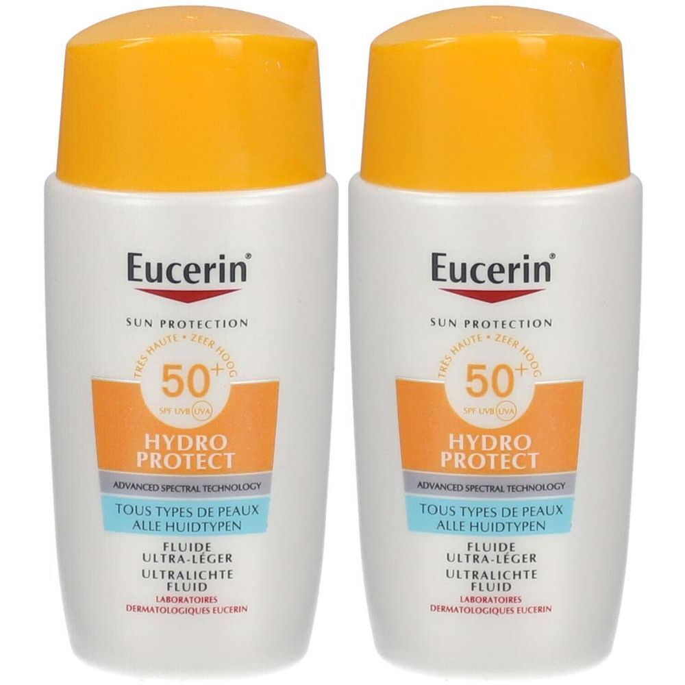Deux flacons blancs avec bouchons jaunes. Inscription: Eucerin Sun Protection, Hydro Protect, SPF 50+. Pour tous types de peaux.