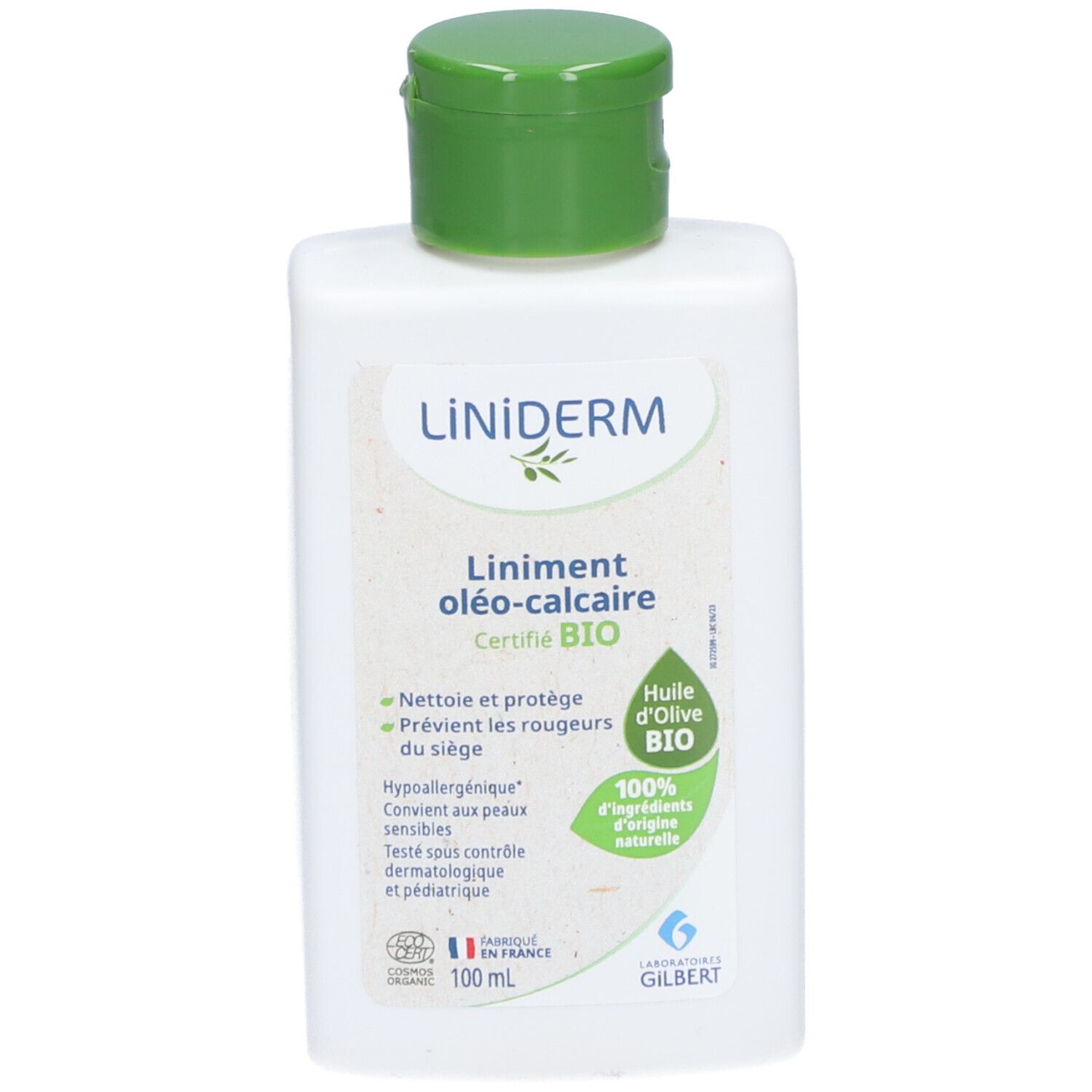 Weiße Flasche mit grünem Deckel. Aufschrift: Liniderm, Liniment oléo-calcaire Certifié BIO. Grünes Etikett mit Text.