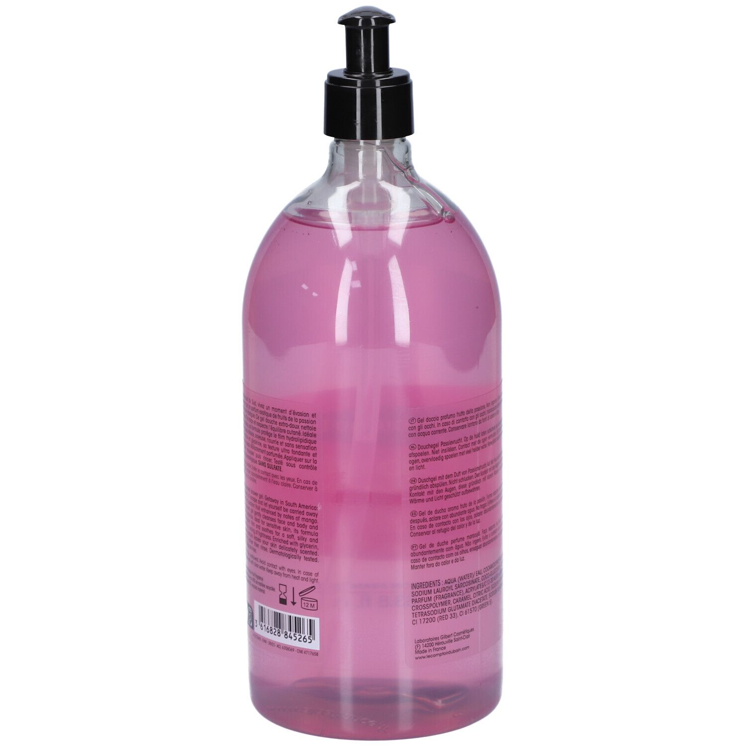 Vue arrière d'un flacon transparent avec liquide rose. Texte sur l'étiquette, pompe noire.