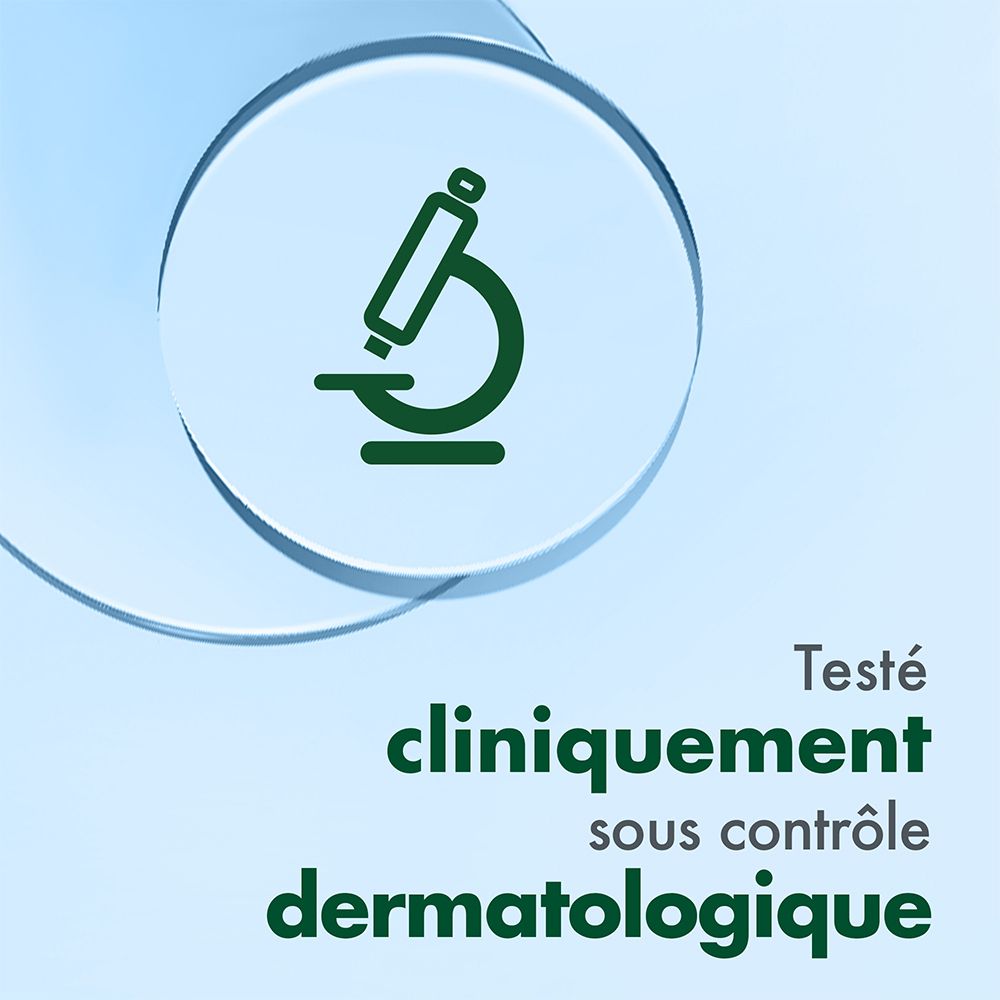 Symbole de microscope. Texte: Testé cliniquement sous contrôle dermatologique.
