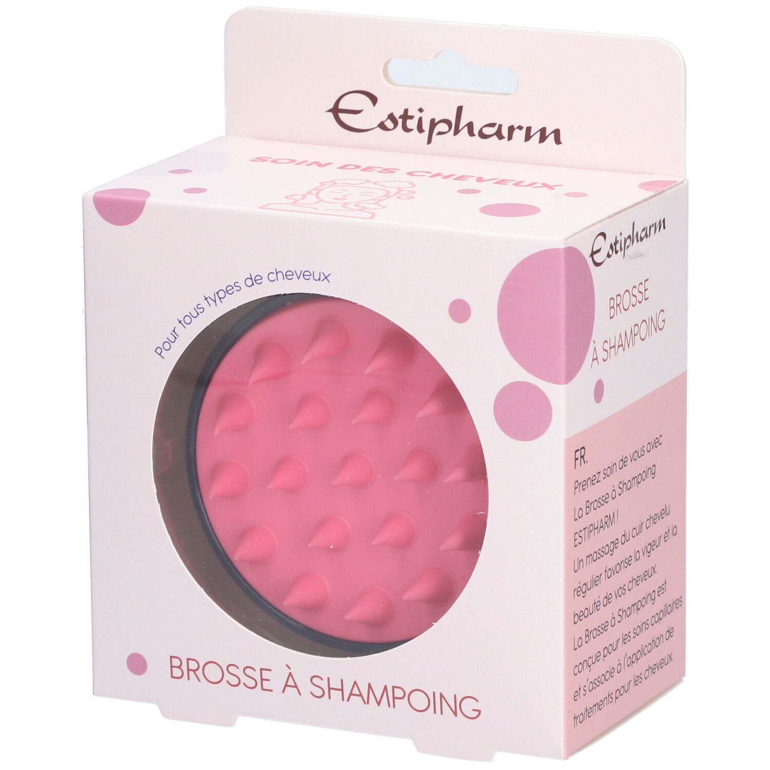Brosse à shampoing rose dans son emballage. Visible: marque Estipharm, nom du produit, brosse ronde à picots.