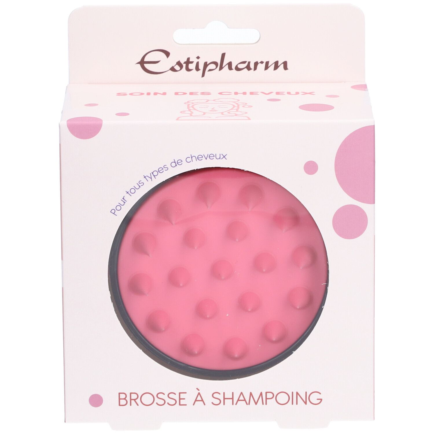 Brosse à shampoing rose dans son emballage. Visible: marque Estipharm, nom du produit, brosse ronde à picots.