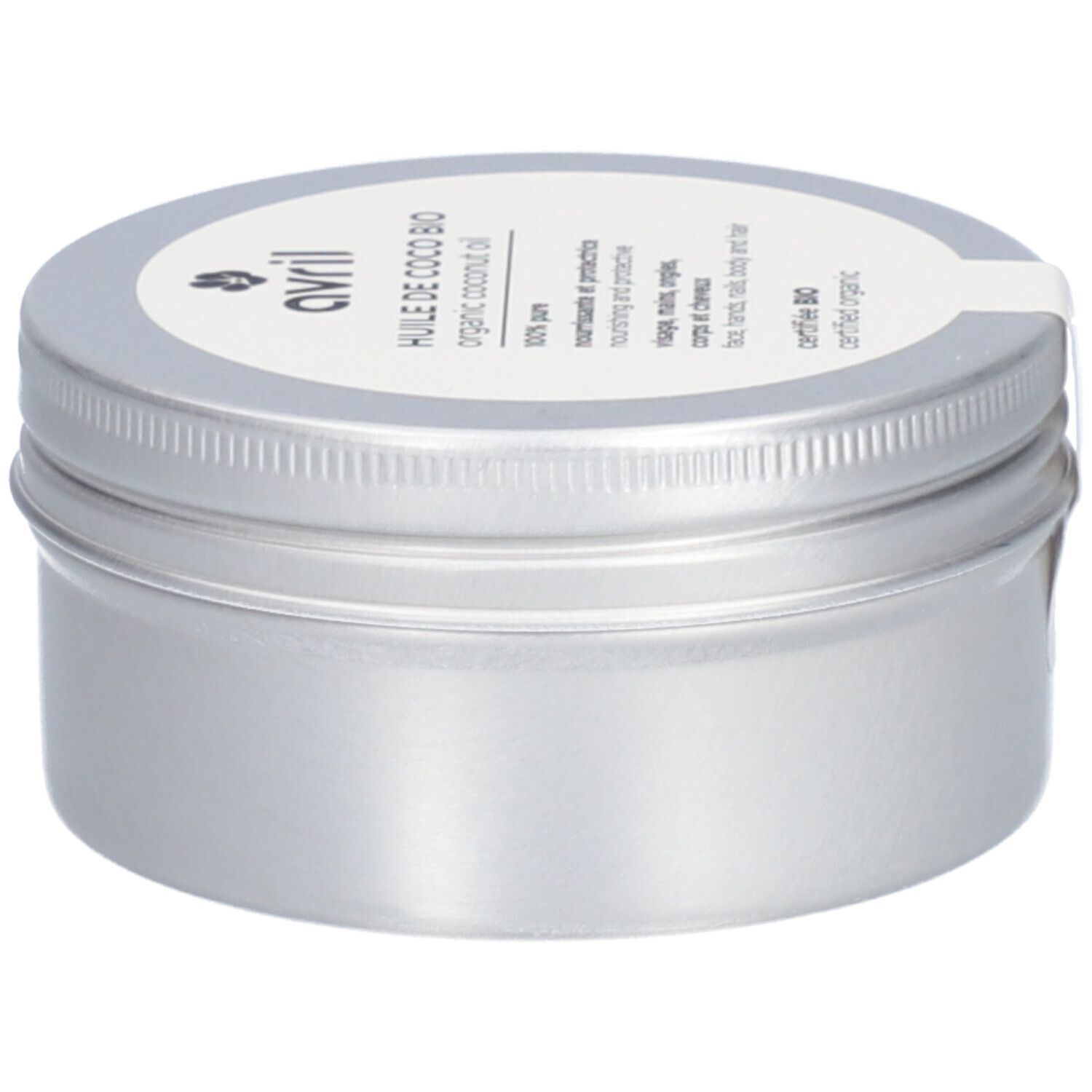 Boîte argentée avec couvercle blanc. Inscription: Avril, Huile de Coco Bio, certifié Bio. Avec une étiquette blanche.
