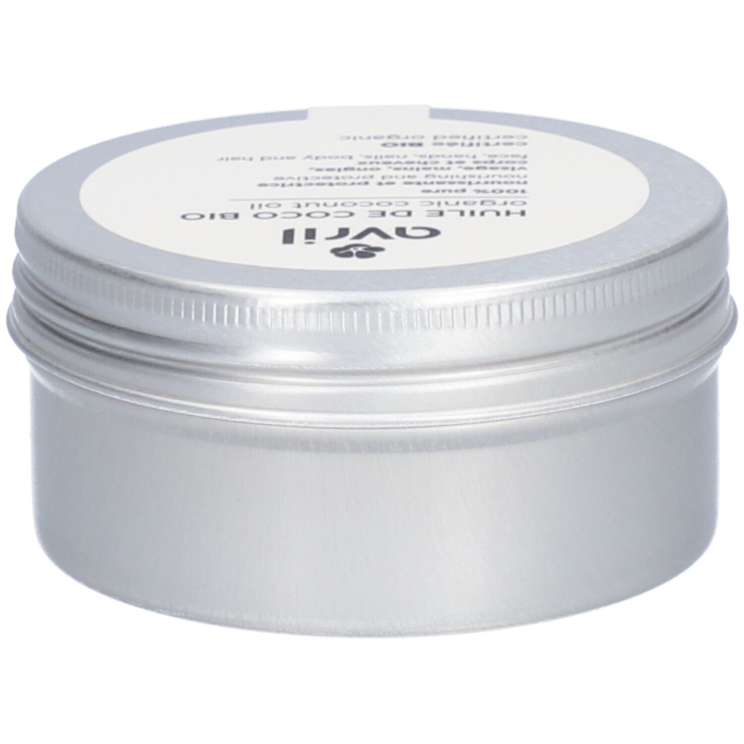 Boîte argentée avec couvercle blanc. Inscription: Avril, Huile de Coco Bio, certifié Bio. Avec une étiquette blanche.