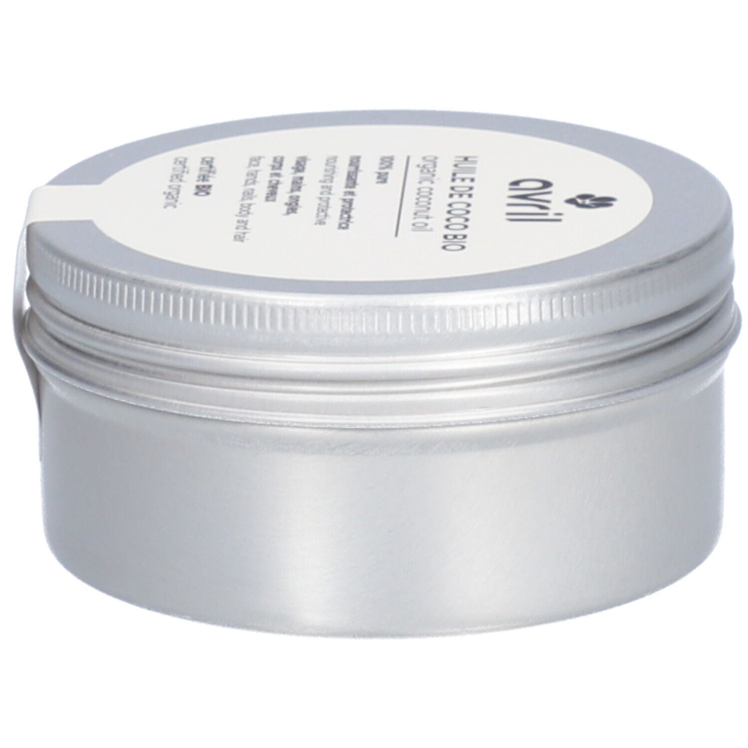 Boîte argentée avec couvercle blanc. Inscription: Avril, Huile de Coco Bio, certifié Bio. Avec une étiquette blanche.