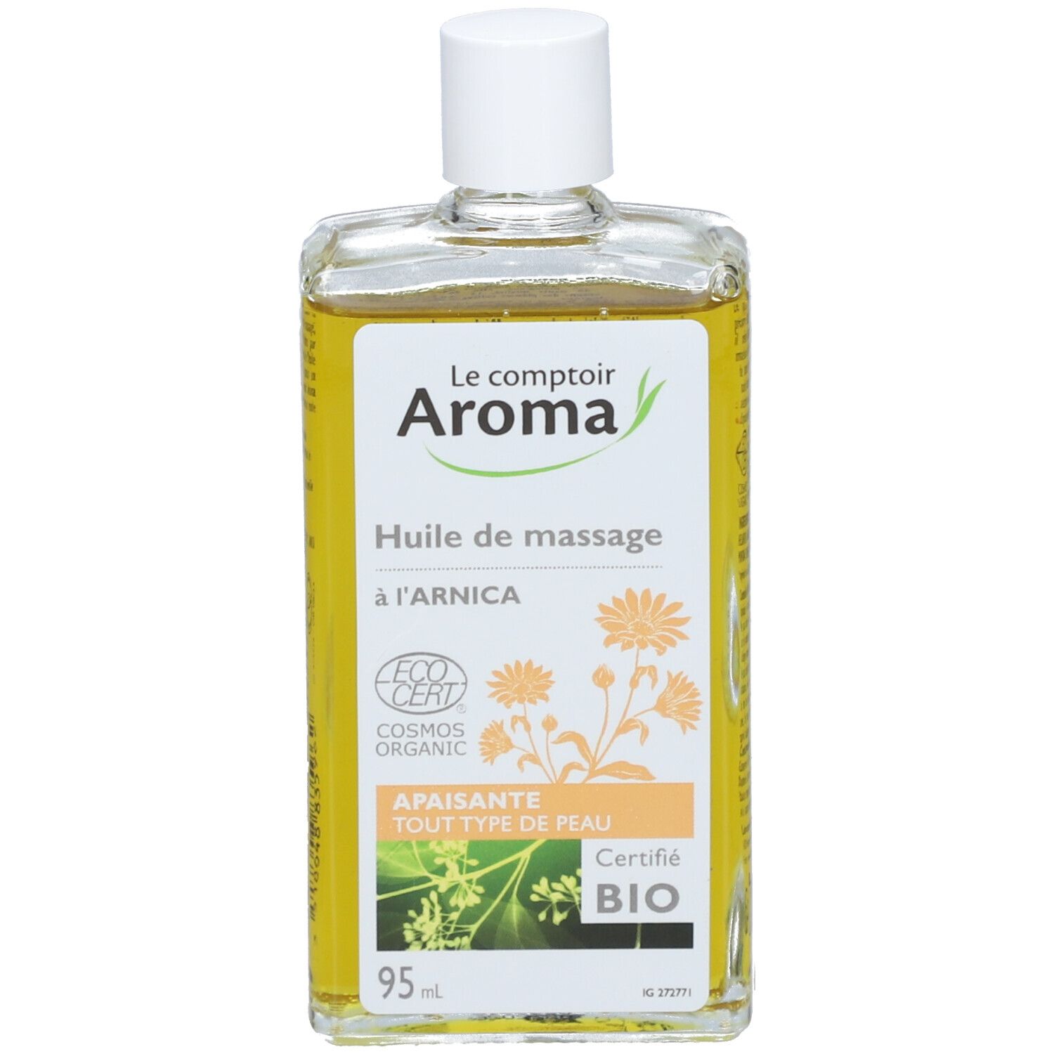 Transparante fles met gele olie. Label: Le comptoir Aroma, Huile de massage à l'arnica. Bio-certificering.