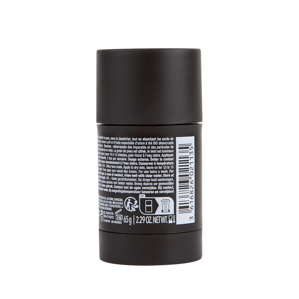 Schwarze zylindrische Verpackung. Text auf Französisch. Enthält Informationen über die Inhaltsstoffe und die Anwendung des Produkts.
