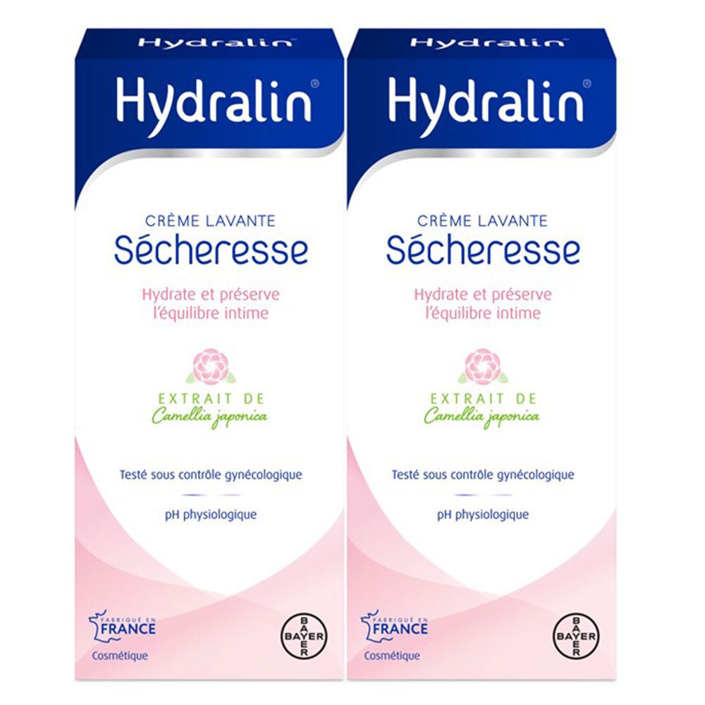 Deux boîtes de Hydralin Sécheresse Crème Lavante. Emballage blanc et bleu. Texte : Crème Lavante Sécheresse, pH physiologique.
