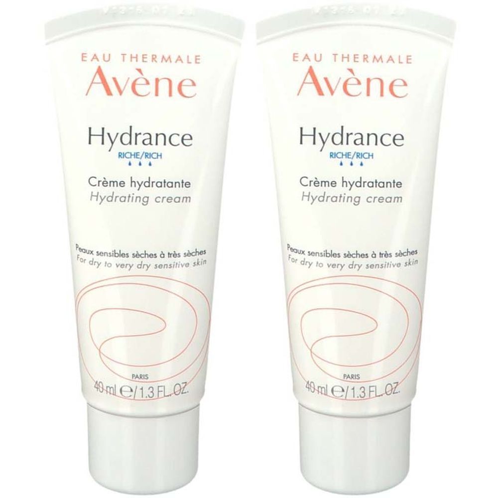 Deux tubes de crème hydratante Avène Hydrance. Tubes blancs avec texte rouge et bleu. Texte: Crème hydratante, Hydrating cream.