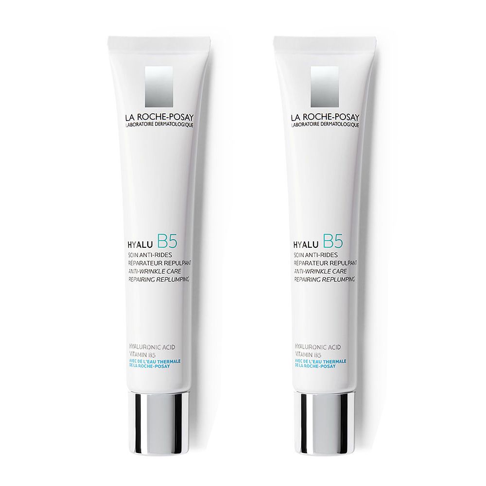 Deux tubes de soin anti-rides LA ROCHE-POSAY HYALU B5. Tubes blancs avec bouchons argentés. Texte: HYALU B5, soin anti-rides.