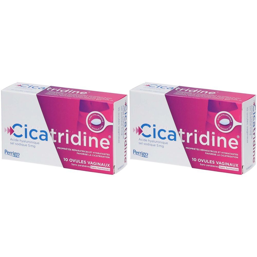 Deux boîtes de Cicatridine. Inscription: 10 Ovules Vaginaux. Fabricant Perrigo. Emballage rose et blanc.
