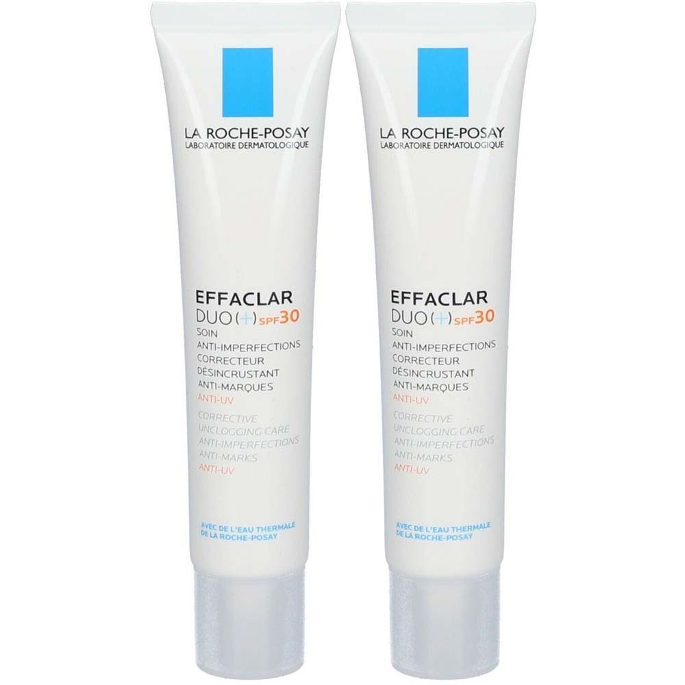 Deux tubes de LA ROCHE-POSAY EFFACLAR DUO (+) SPF30. Tubes blancs avec carrés bleus et inscriptions. Texte : Anti-imperfections, correcteur.
