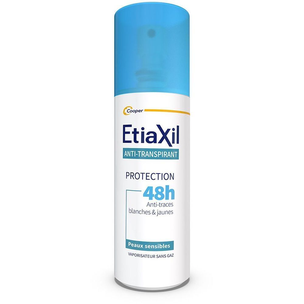 Etiaxil Anti-transpirant. Flacon blanc, bouchon bleu. Inscriptions : nom du produit, caractéristiques.