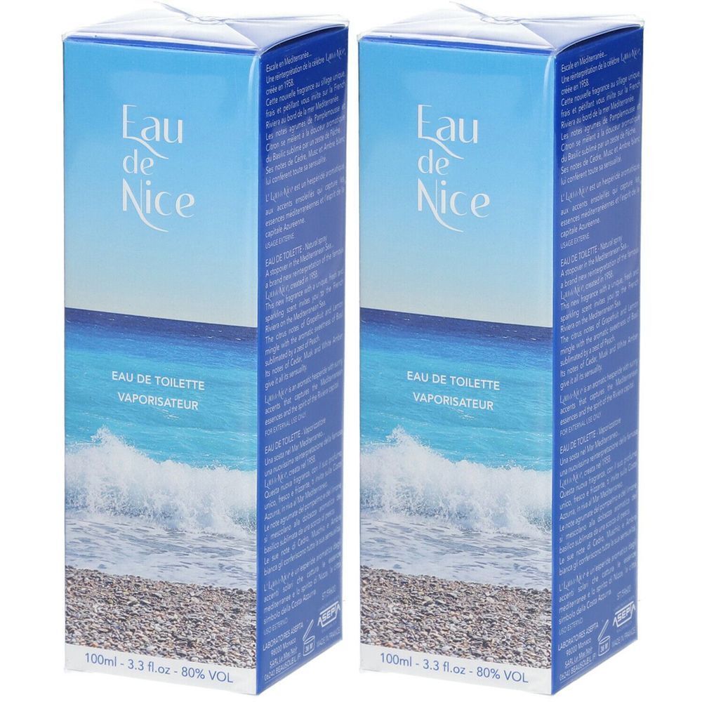 Deux boîtes bleues avec "Eau de Nice". Inscription "EAU DE TOILETTE VAPORISATEUR". Image de mer et plage. 100ml, 3.3 fl oz, 80% VOL.