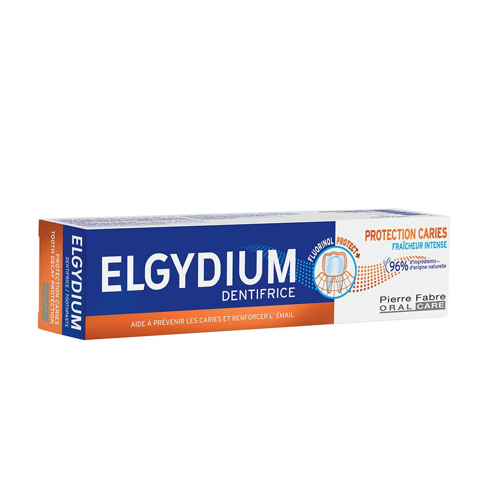 Boîte de dentifrice ELGYDIUM. Inscription : Protection Caries, 96% ingrédients d'origine naturelle. Pierre Fabre.