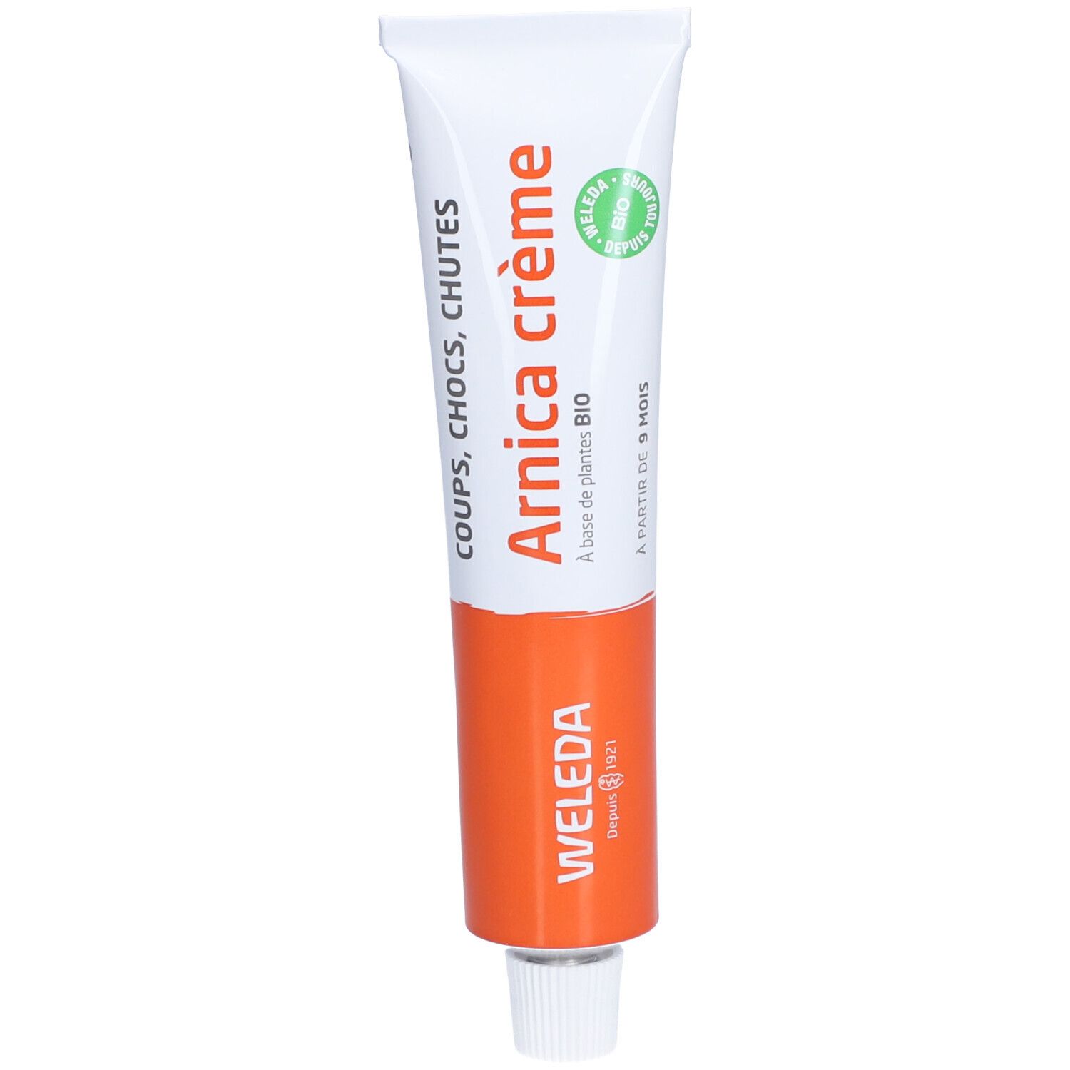 Tube mit weißem und orangefarbenem Design. Aufschrift: Arnica crème, WELEDA. Grün-Siegel.