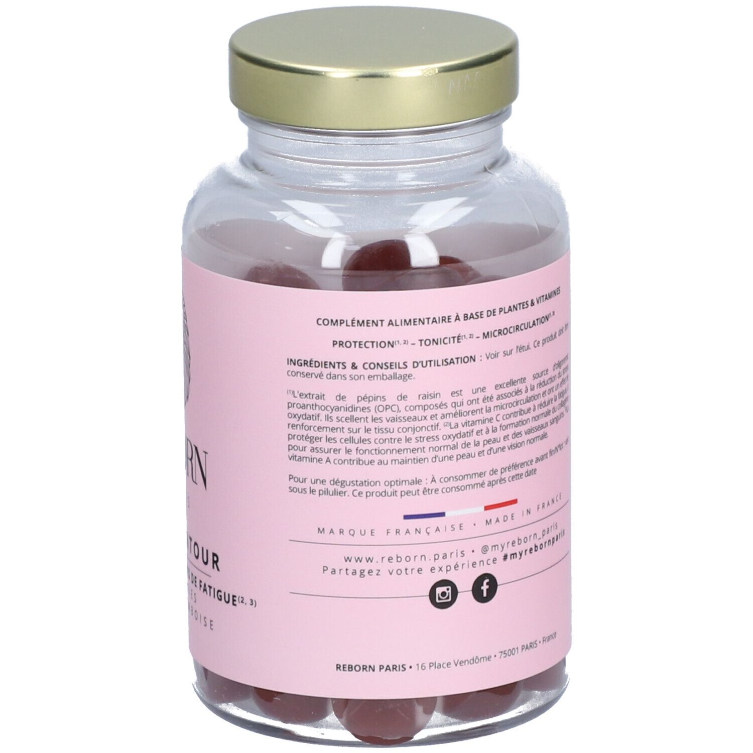 Flacon avec étiquette rose. Contient des gummies rouges. Inscription: REBORN PARIS, Eye & Contour. Ingrédients et conseils d'utilisation.