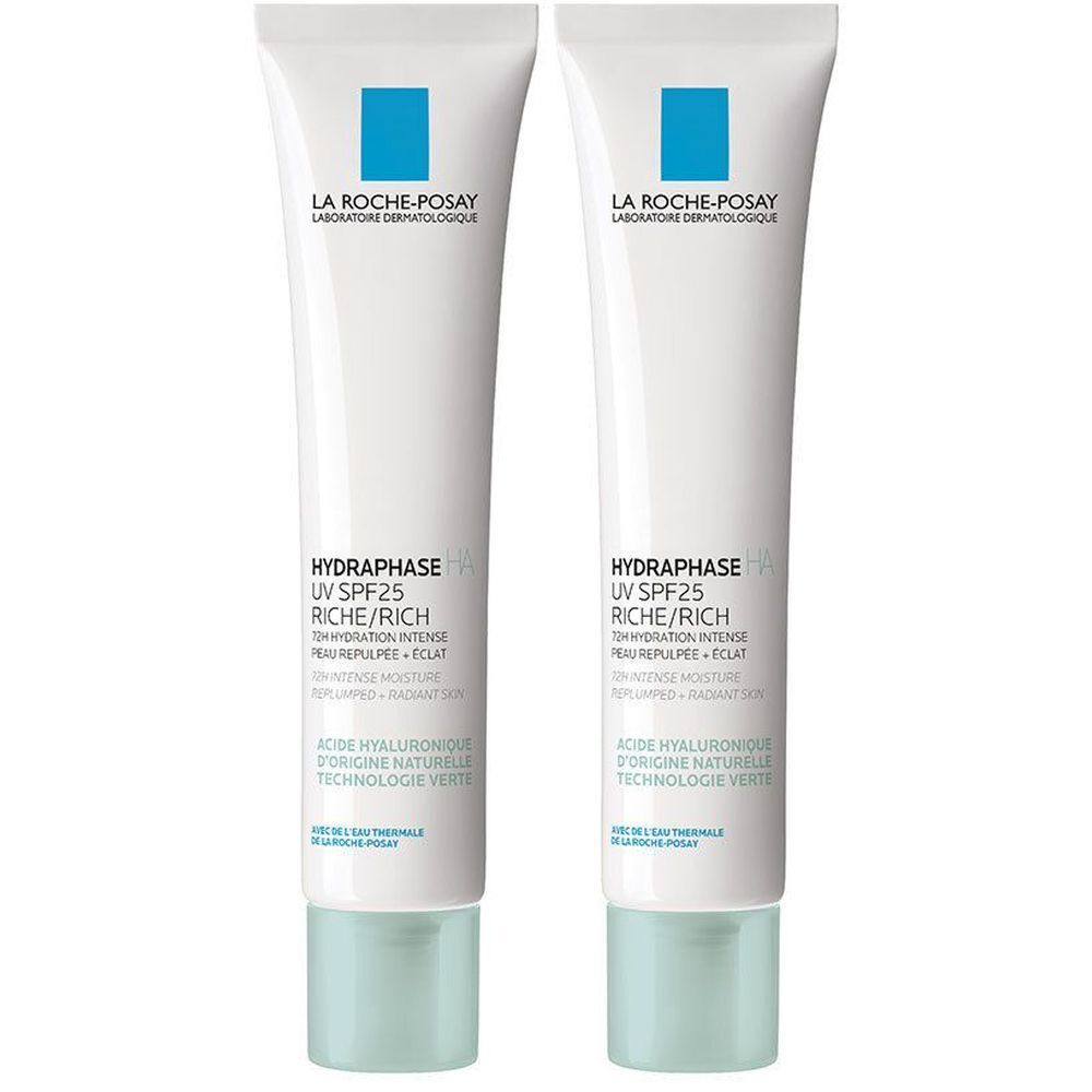Zwei Tuben Creme. Weiß, mit blauem Quadrat und Schriftzug. Produktname: HYDRAPHASE UV SPF25 RICHE/RICH. Grüner Deckel.