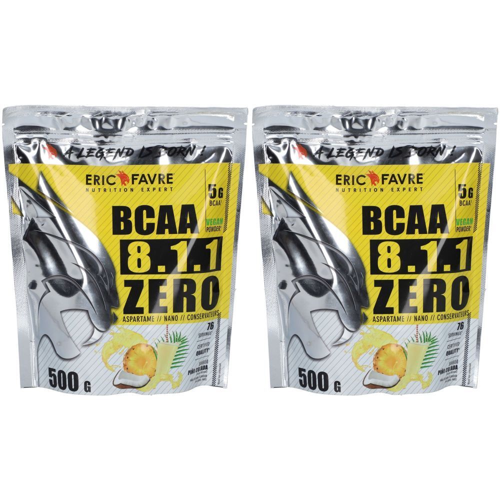 Deux sachets de BCAA 8.1.1 ZERO ERIC FAVRE. Inscription : 500 g, BCAA 8.1.1 ZERO, 56 kcal. Emballage argenté avec étiquette jaune.
