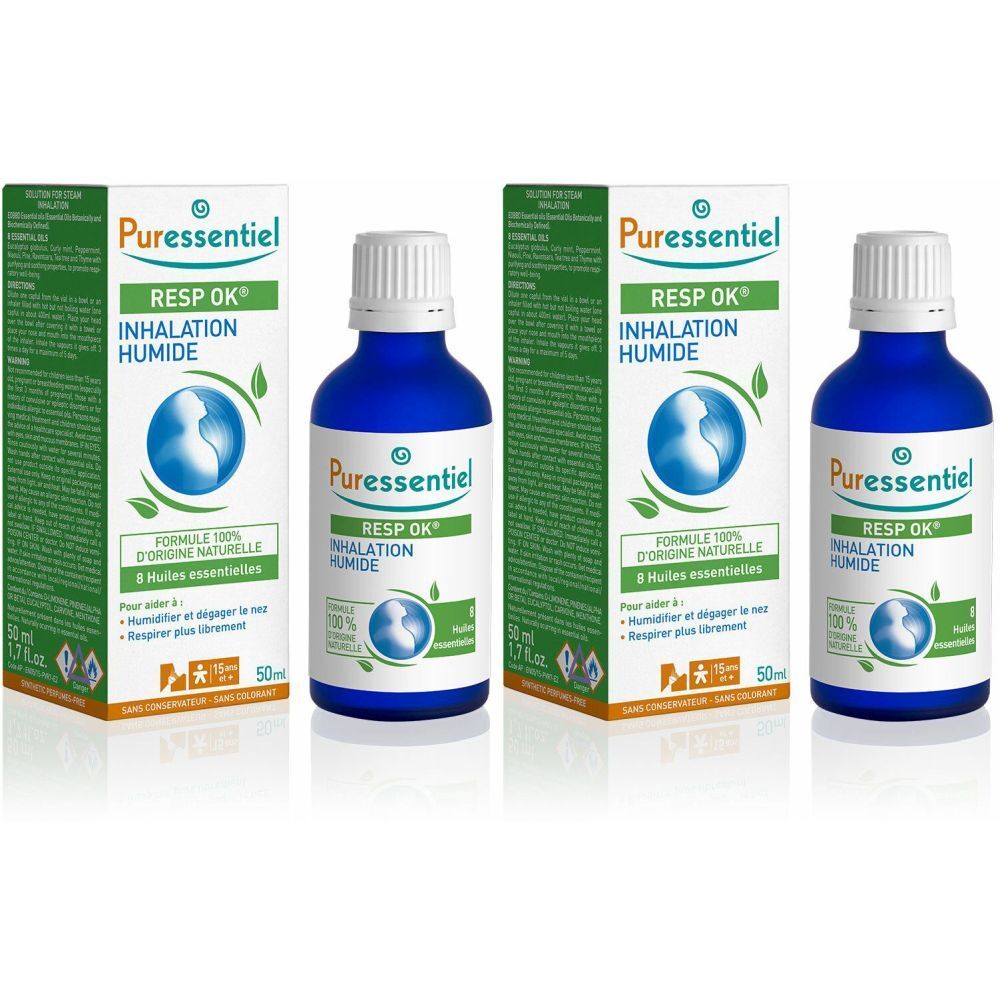 Drei Flaschen und Verpackungen von Puressentiel RESP OK Inhalation Humide. Blaue Flaschen, grüne Verpackung mit Logo.