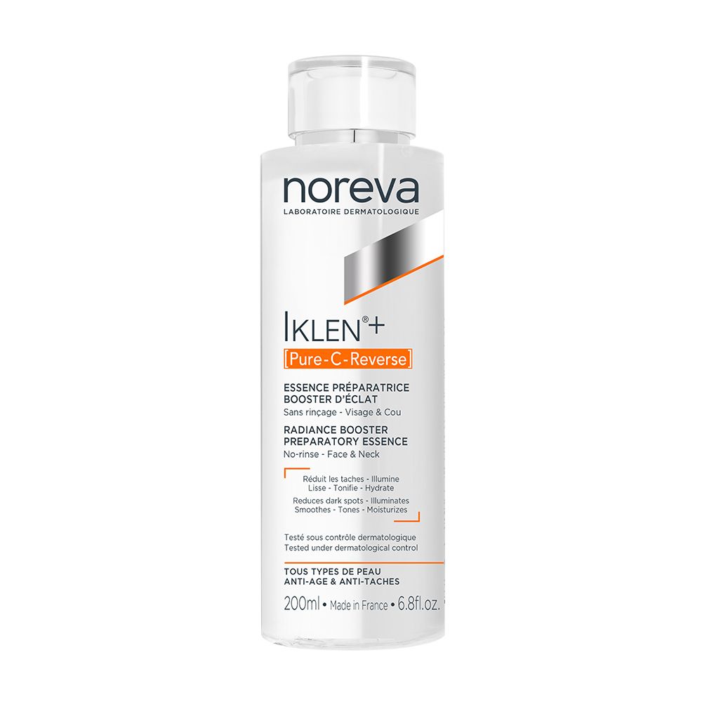 Flacon transparent avec bouchon blanc. Inscription: Noreva Iklen+ Pure-C-Reverse Essence Préparatrice Booster d'Eclat.