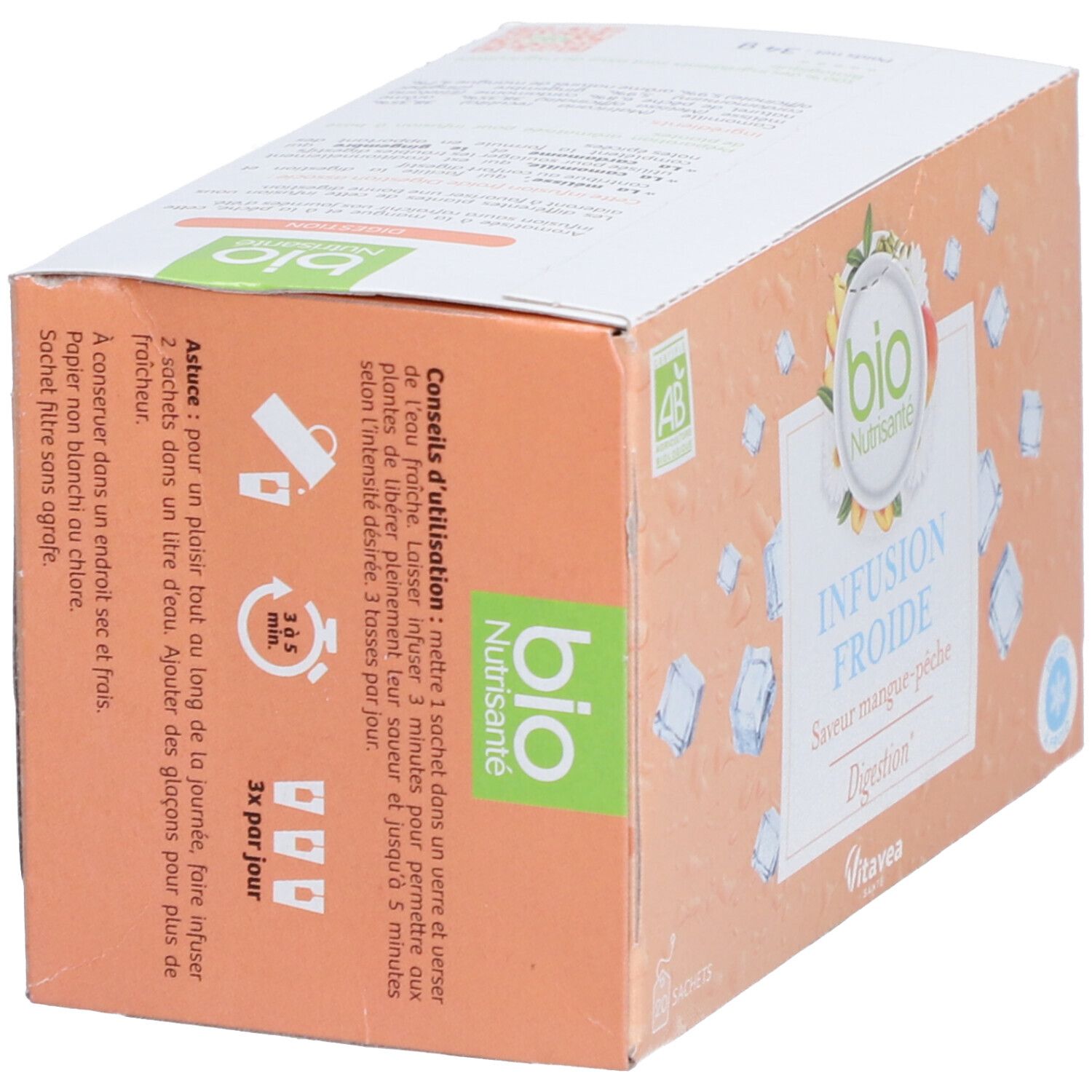 Boîte de thé aux herbes. Inscription : Bio Nutrisanté, Infusion Froide, Saveur mangue-pêche, Digestion. Avec label bio.