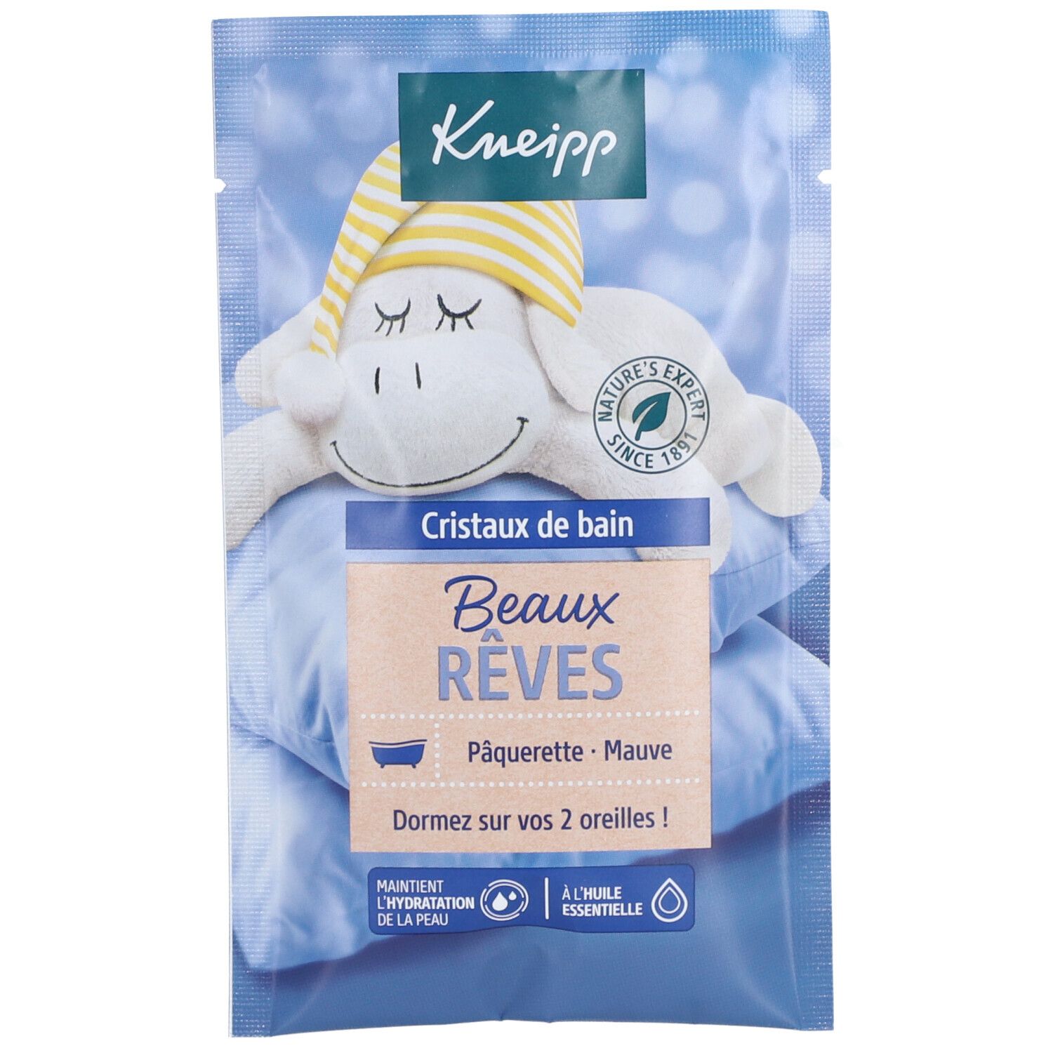 Kneipp Cristaux de Bain Beaux Rêves. Blaue Verpackung mit Produktnamen und Illustration eines schlafenden Schafs.