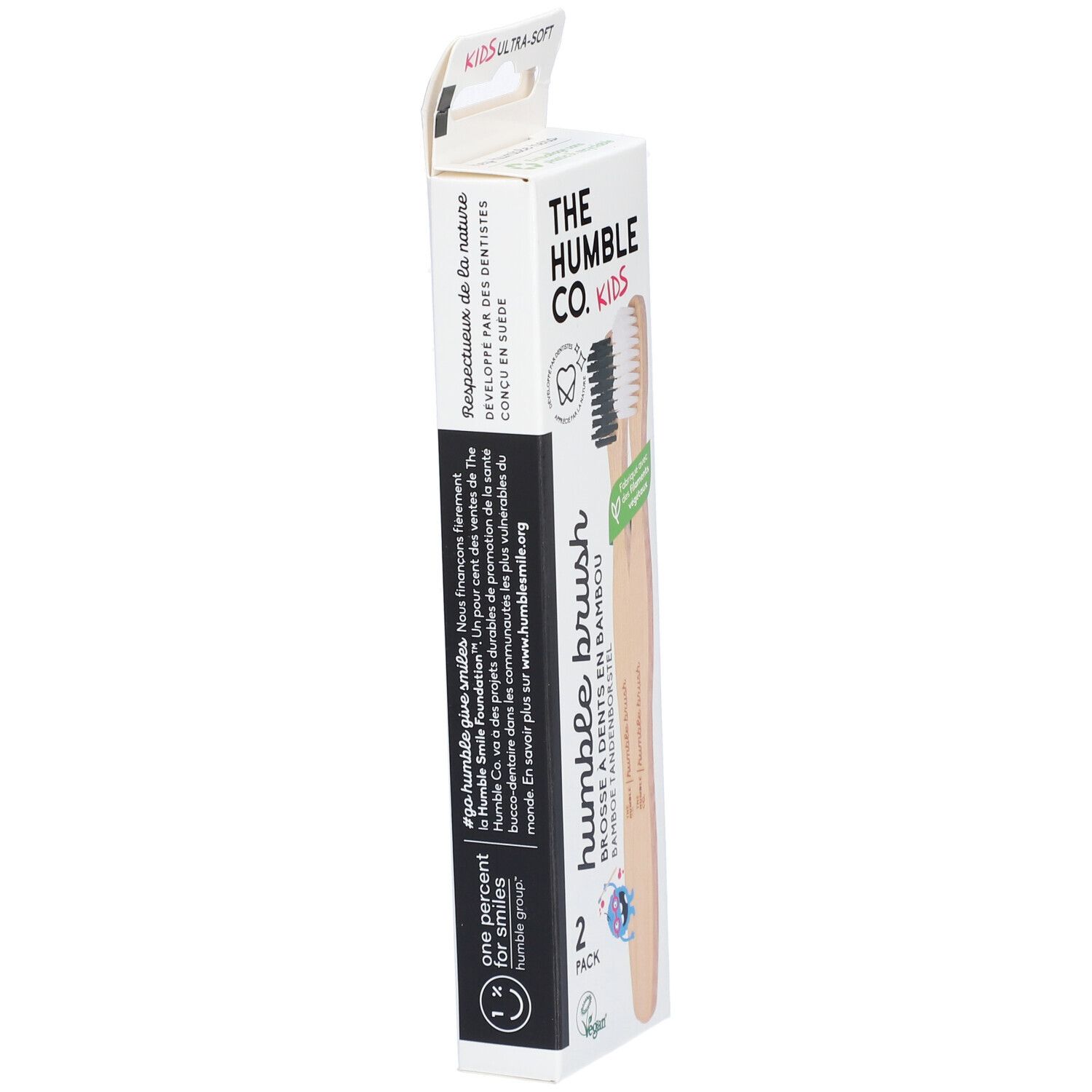 Emballage avec deux brosses à dents en bambou. Inscription: Humble Brush. Pour enfants. Vegan. Durable.