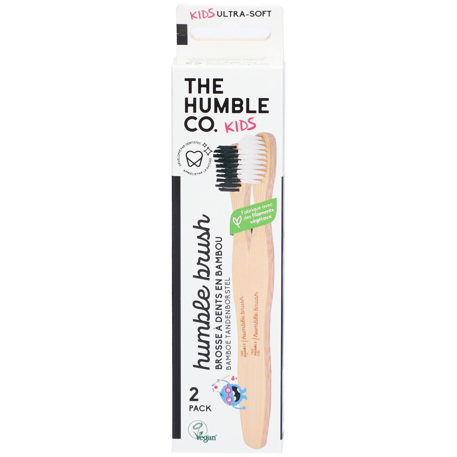 Deux brosses à dents dans un emballage. Inscription: Humble Brush, lot de 2. Brosses à dents en bambou pour enfants.