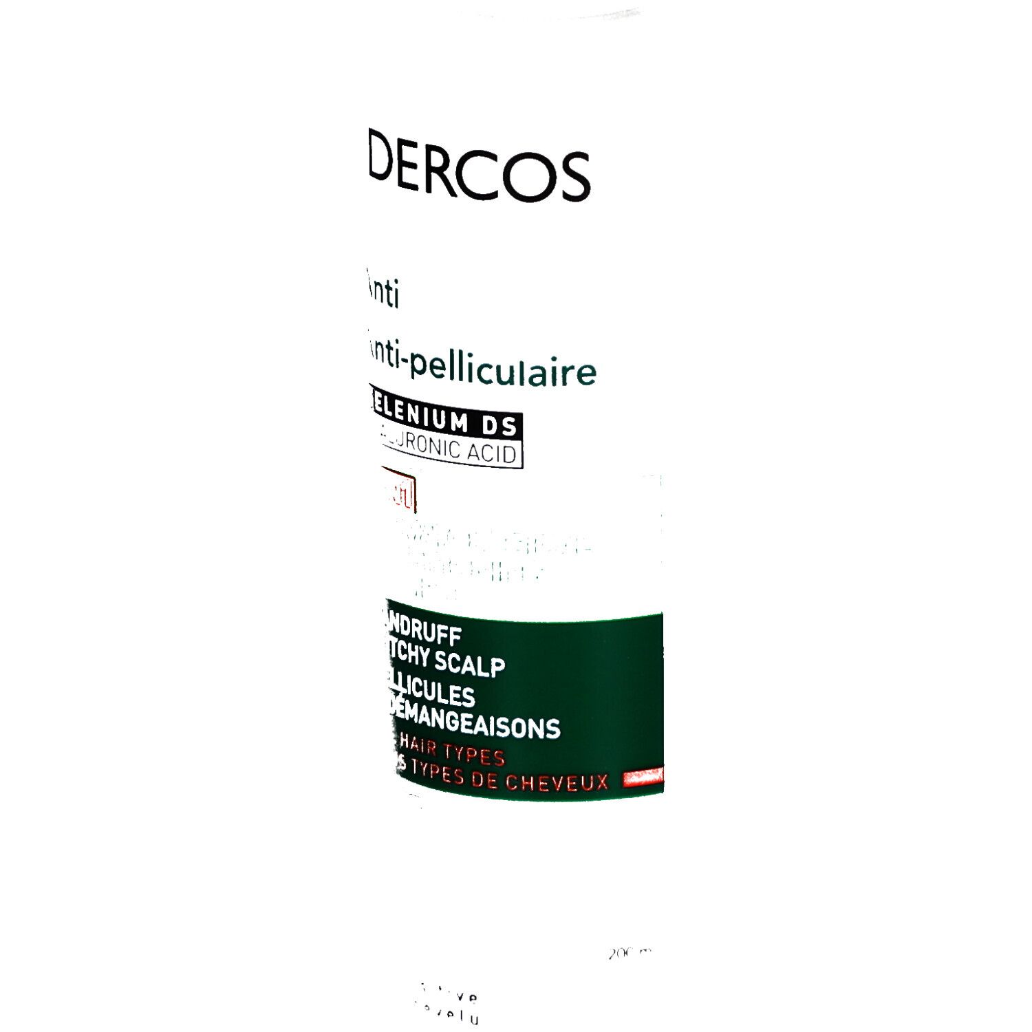 Nahaufnahme der weißen Flasche. Text: DERCOS, Anti-Schuppen, Anti-pelliculaire. Grüner Bereich.