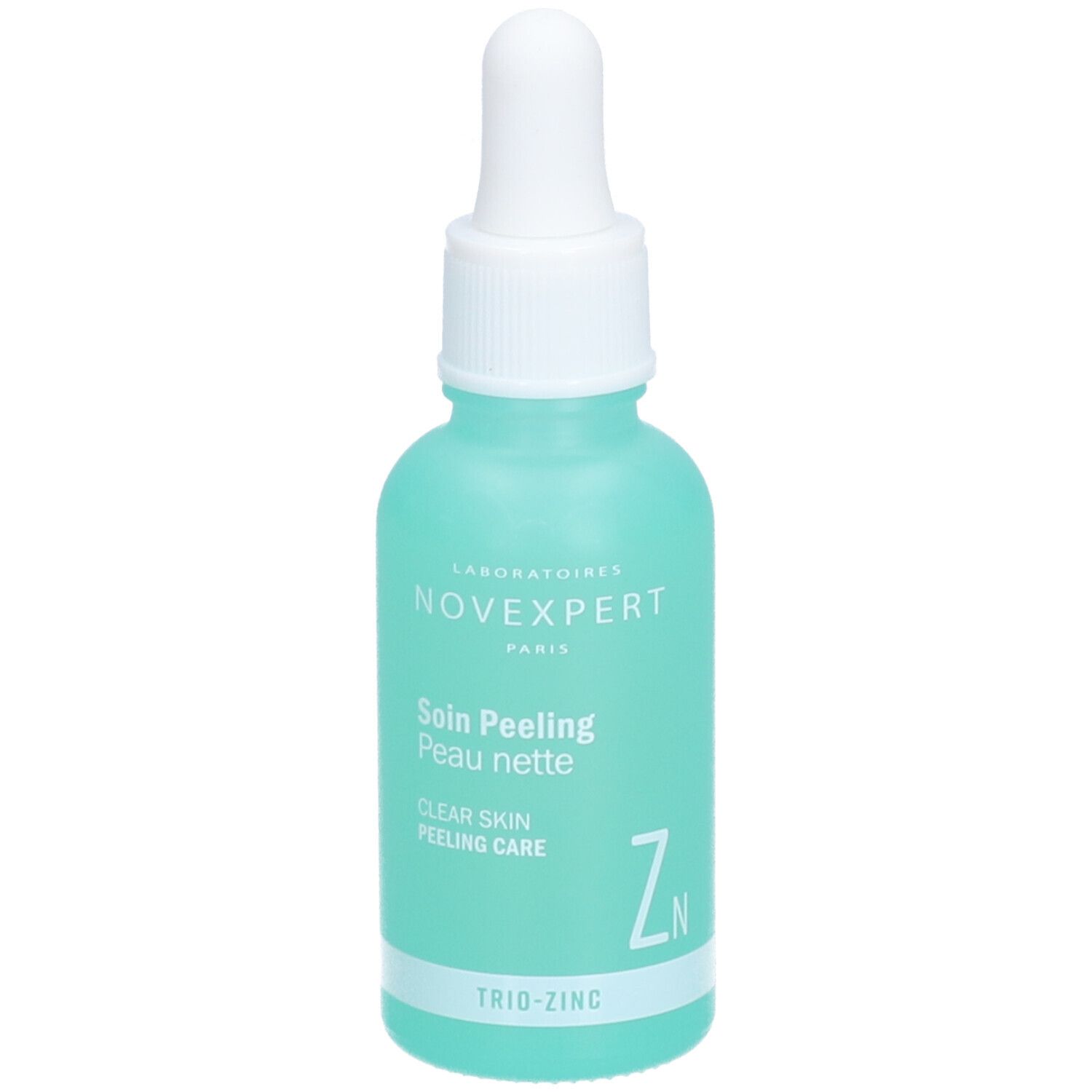 Flacon turquoise avec compte-gouttes blanc. Inscription : Novexpert, Soin Peeling Peau nette, Clear Skin Peeling Care, Trio-Zinc.