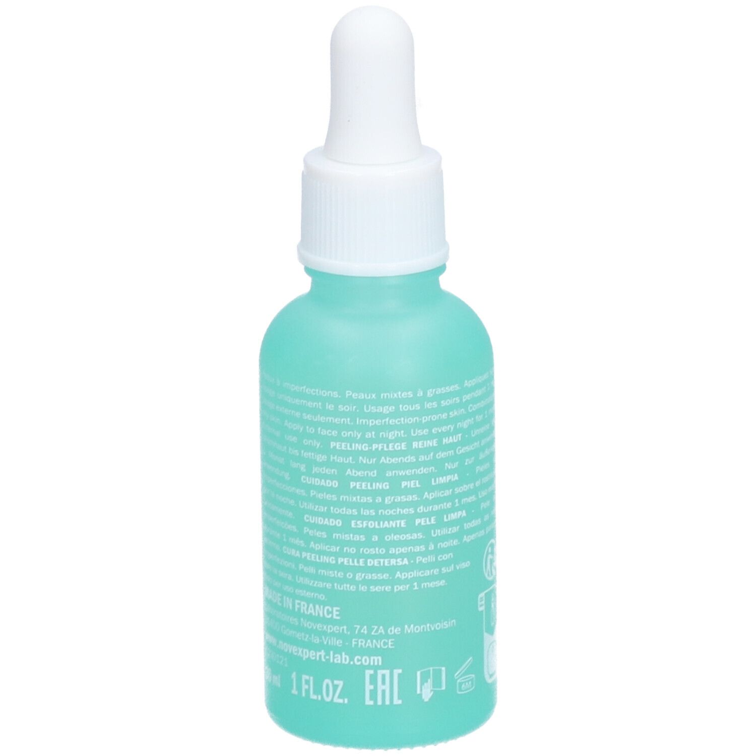 Flacon turquoise avec compte-gouttes blanc. Texte au dos. Inscription : Novexpert-lab, 1 FL.OZ., Eac.