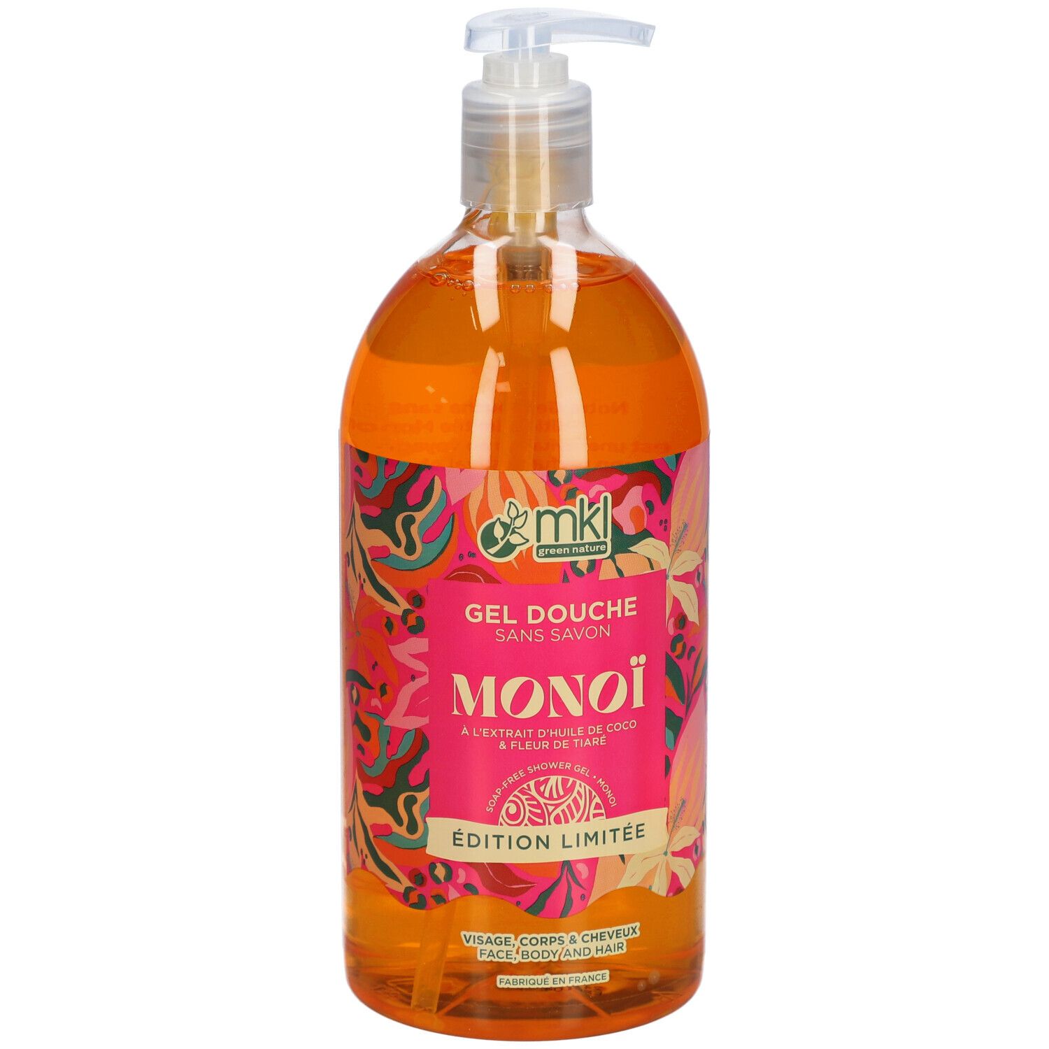 Flacon transparent de gel douche orange. Étiquette rose avec texte MONOÏ, Edition Limitée. Avec pompe.