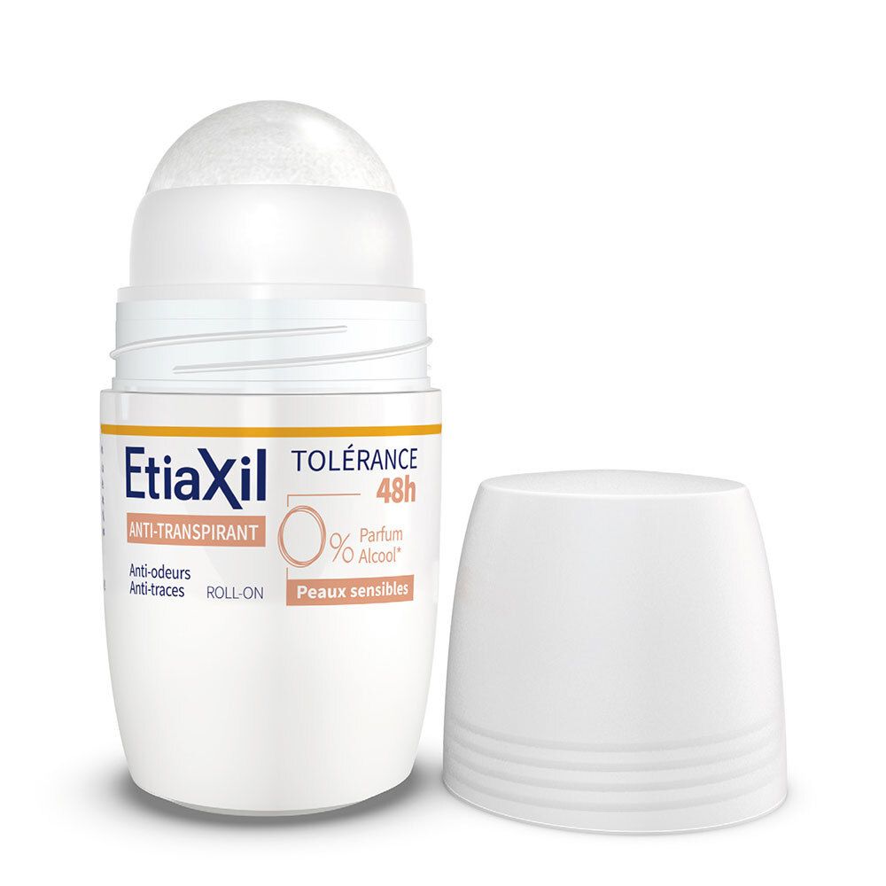 Roll-on blanc avec capuchon ouvert. Bande orange avec texte : Etiaxil, Tolérance 48h, 0% Parfum Alcool. Tête du roll-on visible.