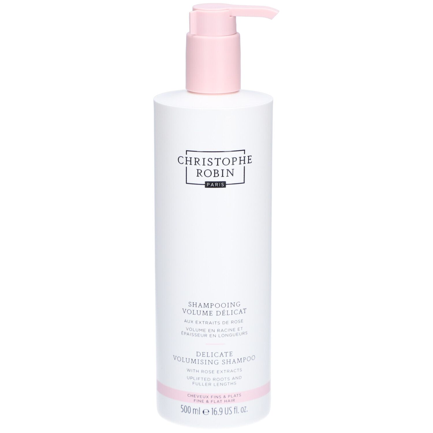 Flacon blanc avec pompe rose. Inscription: CHRISTOPHE ROBIN PARIS. Shampooing Délicat Volume aux Extraits de Rose. 500 ml.