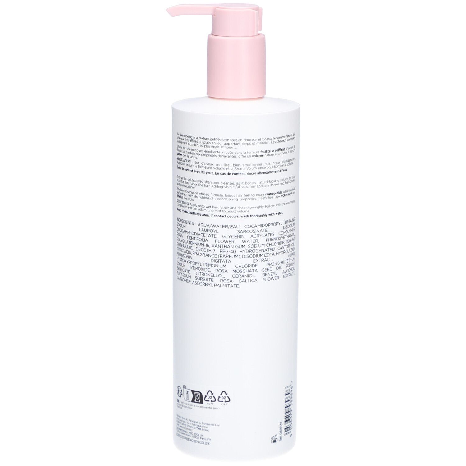 Dos d'un flacon blanc avec pompe rose. Texte avec ingrédients et informations. Symboles de recyclage.