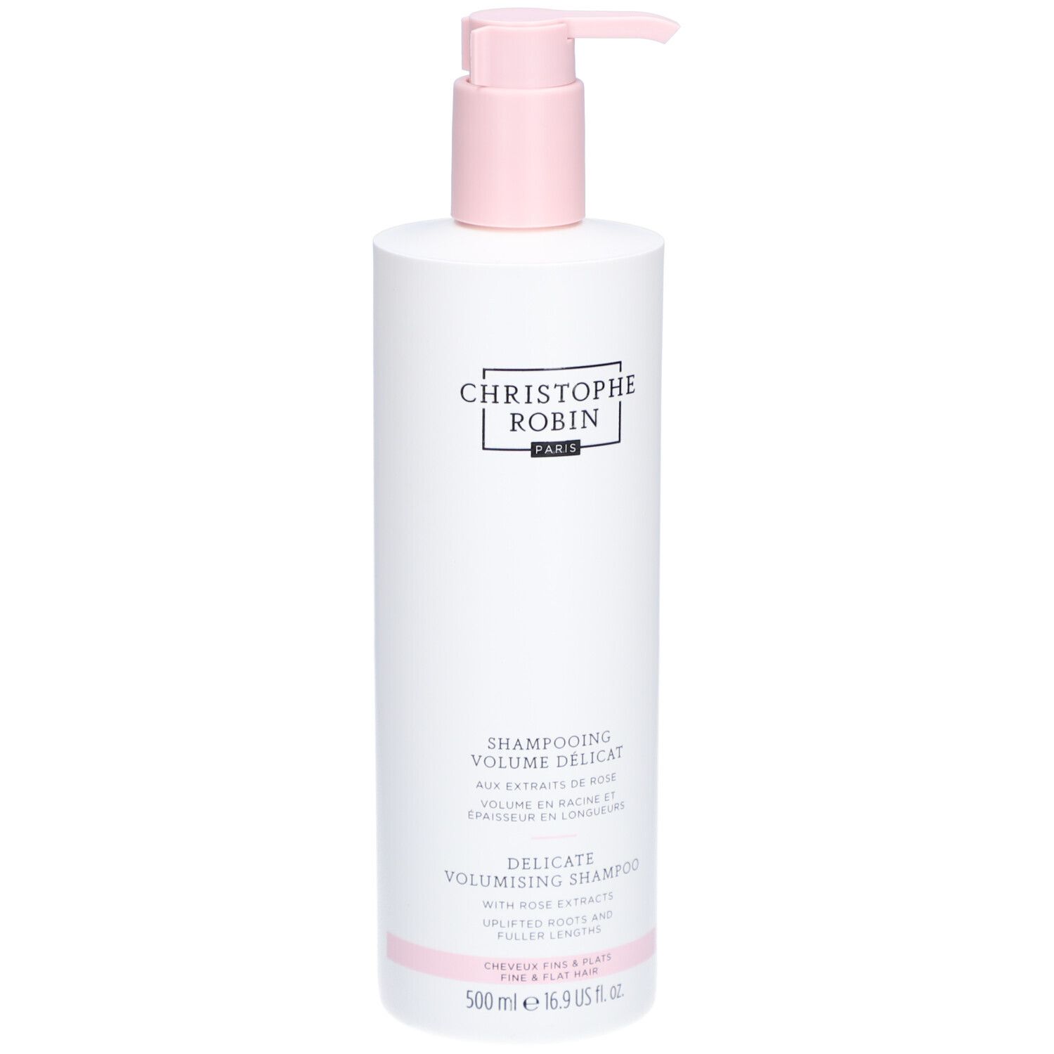 Flacon blanc avec pompe rose. Inscription: CHRISTOPHE ROBIN PARIS. Shampooing Délicat Volume aux Extraits de Rose. 500 ml.
