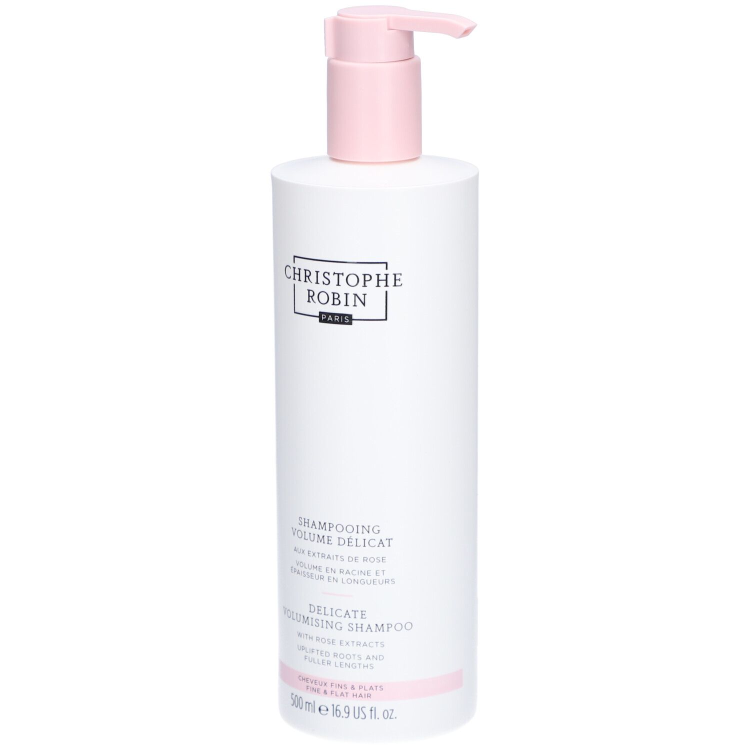 Flacon blanc avec pompe rose. Inscription: CHRISTOPHE ROBIN PARIS. Shampooing Délicat Volume aux Extraits de Rose. 500 ml.