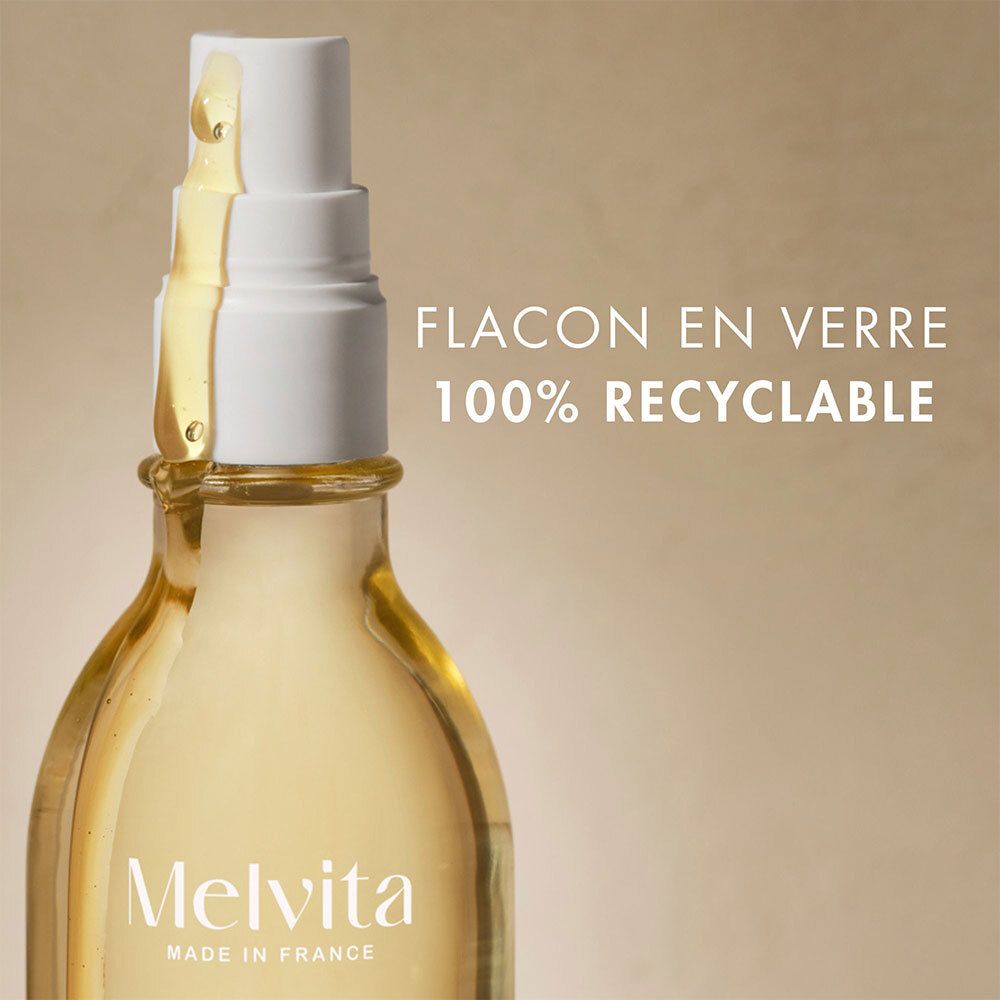 Melvita L'Or Bio Ölflasche. Text: Flasche aus 100% recycelbarem Glas.