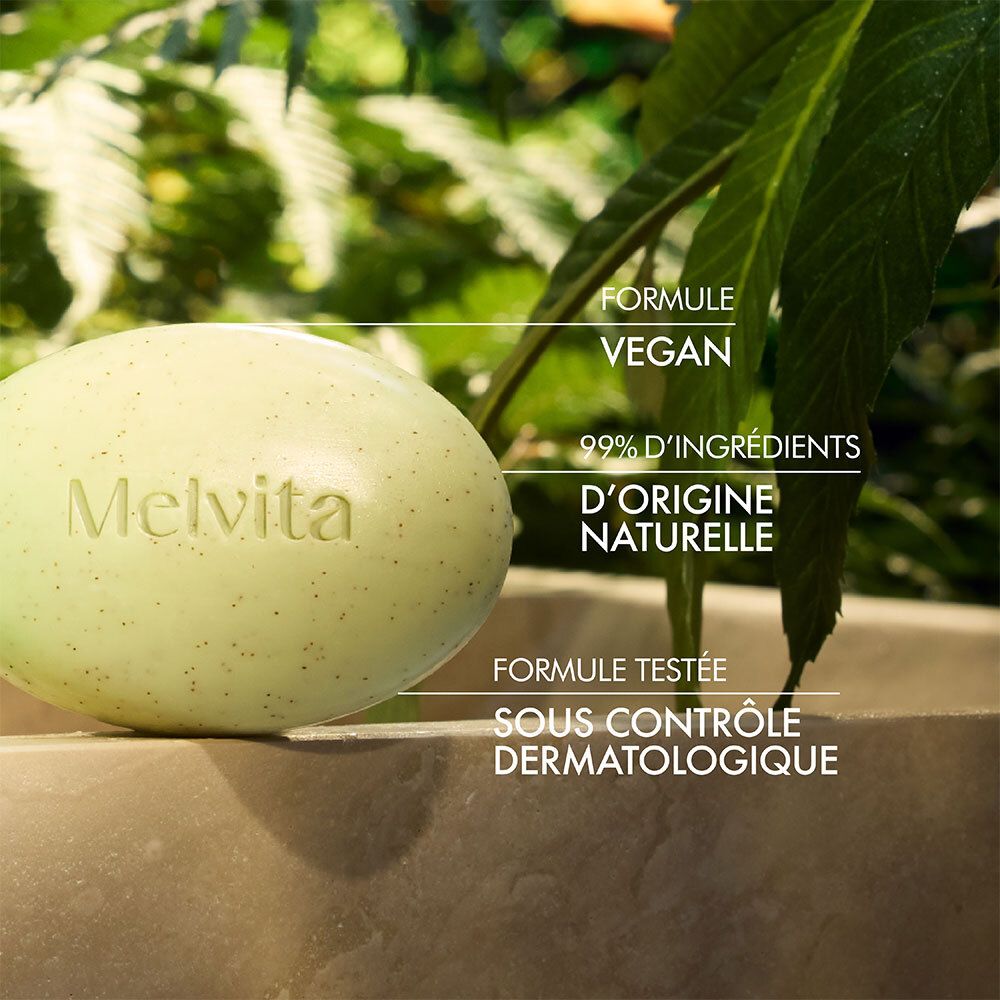 Seifenstück mit 'Melvita' und Text: Formule vegan, 99% d'ingrédients d'origine naturelle, Formule testée sous contrôle dermatologique.
