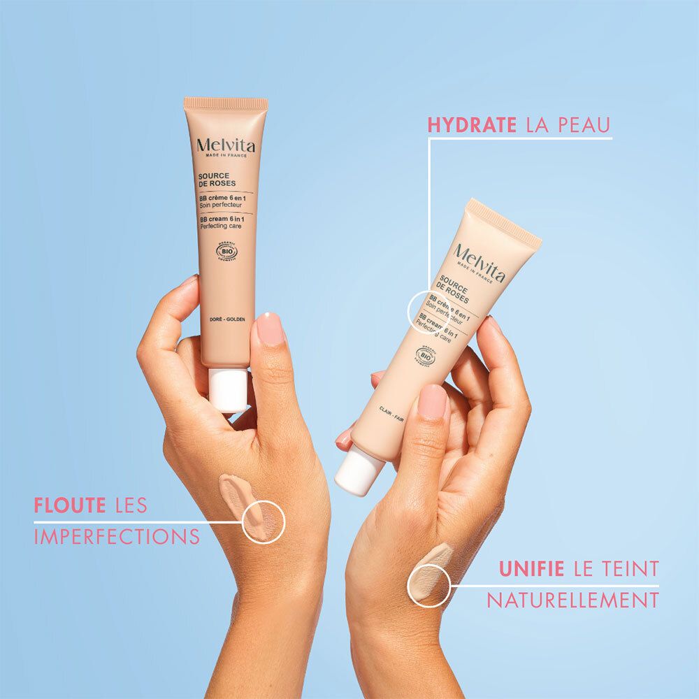 Hände halten zwei BB Cream Tuben. Textur-Beispiele: Unreinheiten ausblenden, Teint natürlich vereinheitlichen.