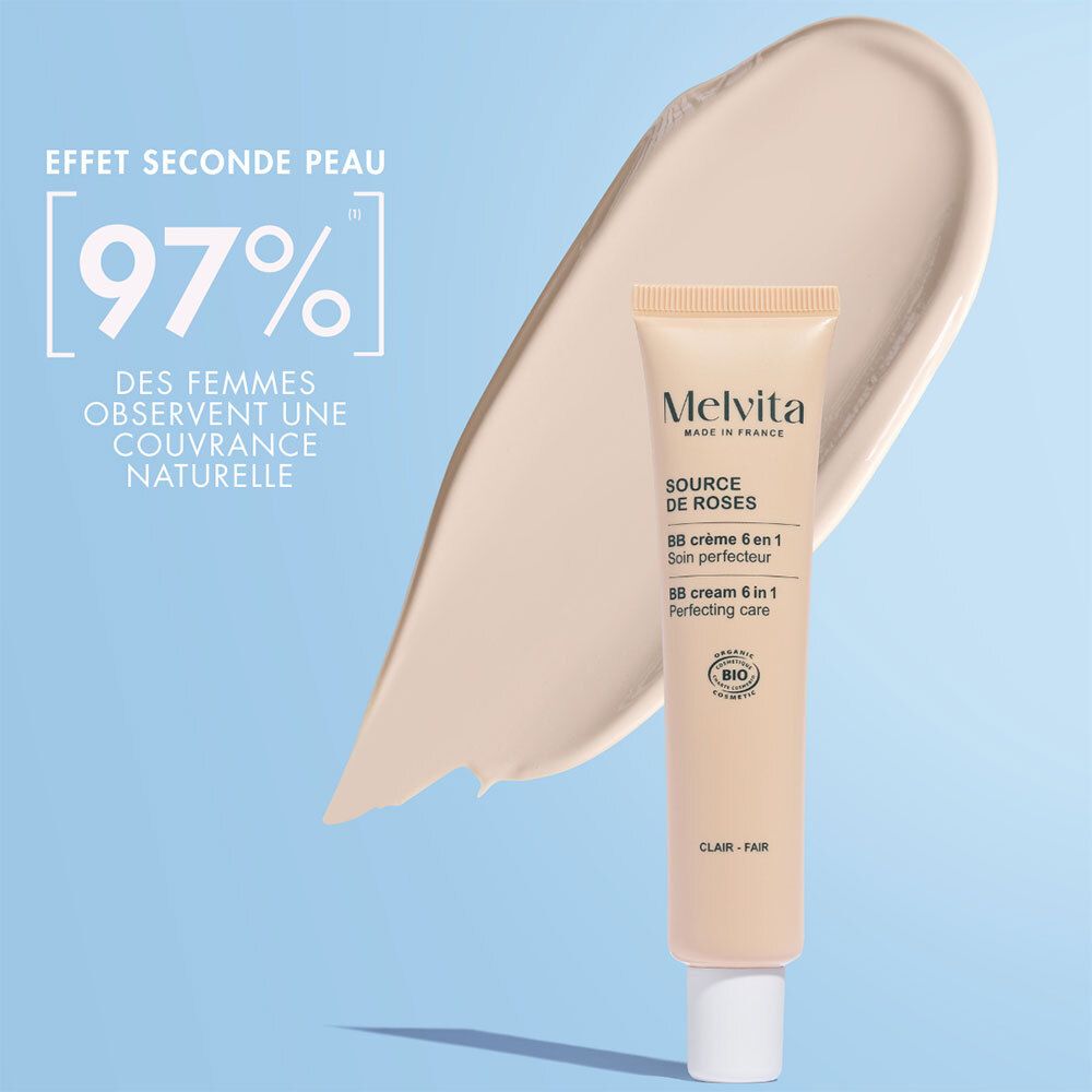 BB Cream Tube und Textur-Beispiel. 97% der Frauen beobachten eine natürliche Deckkraft. Blauer Hintergrund.