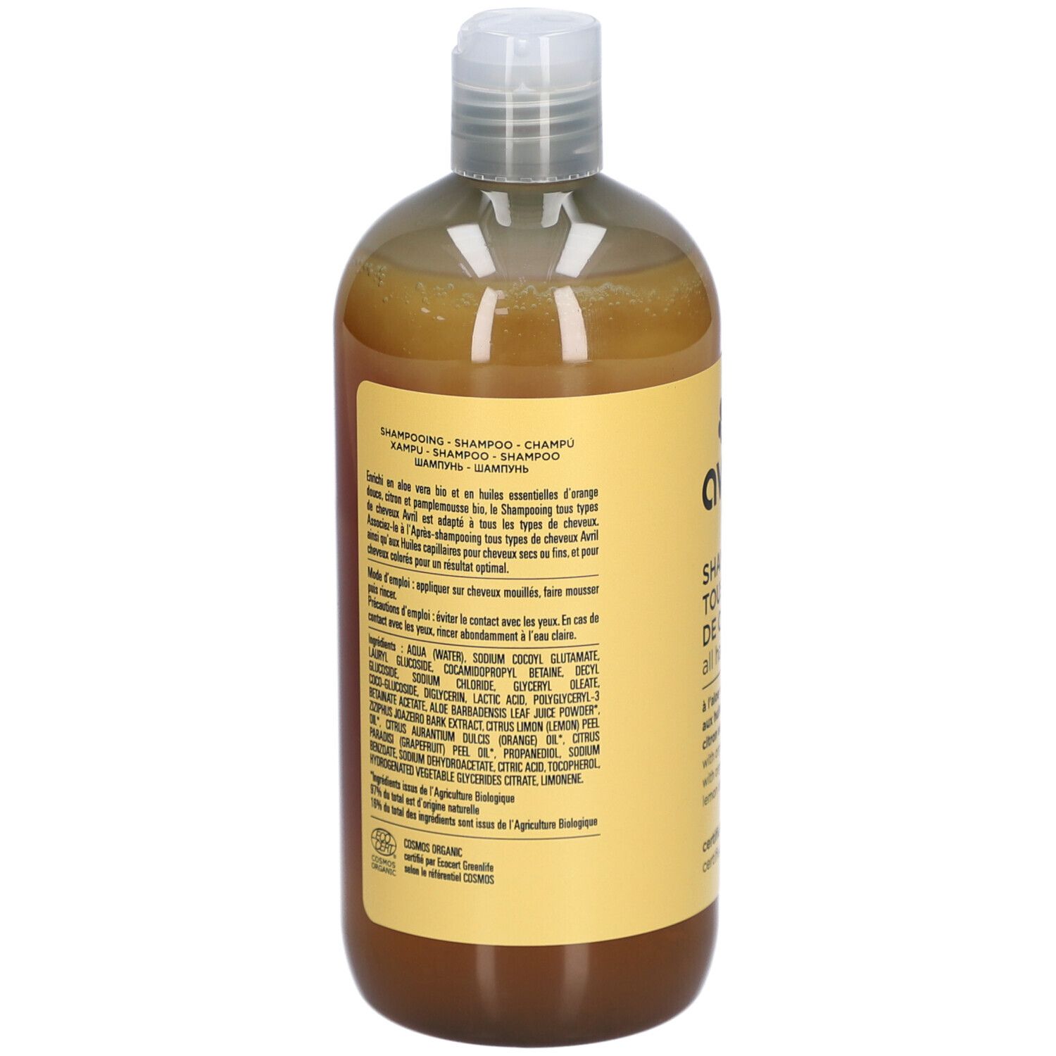 Dos du flacon de shampooing. Ingrédients et instructions. Certification bio. Texte en plusieurs langues.