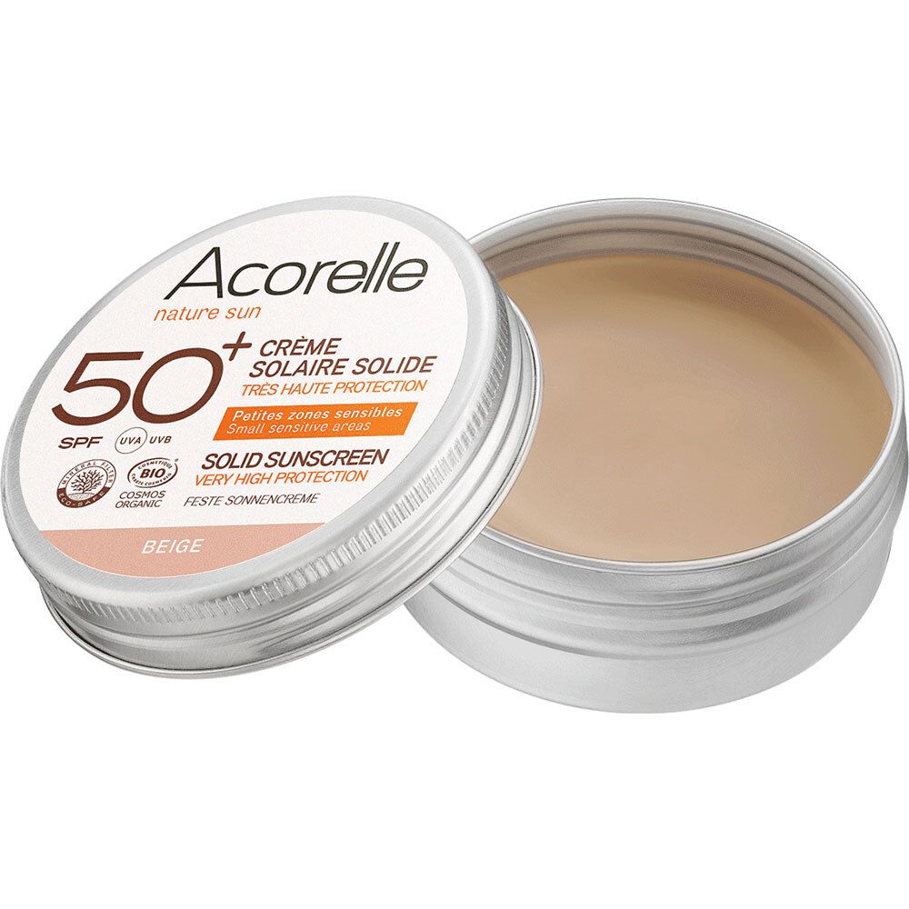 Sonnencreme in Dose. Deckel mit Aufschrift Acorelle, SPF 50+. Beige Creme. Bio-Zertifizierung. "Crème solaire solide" und "Very high protection".