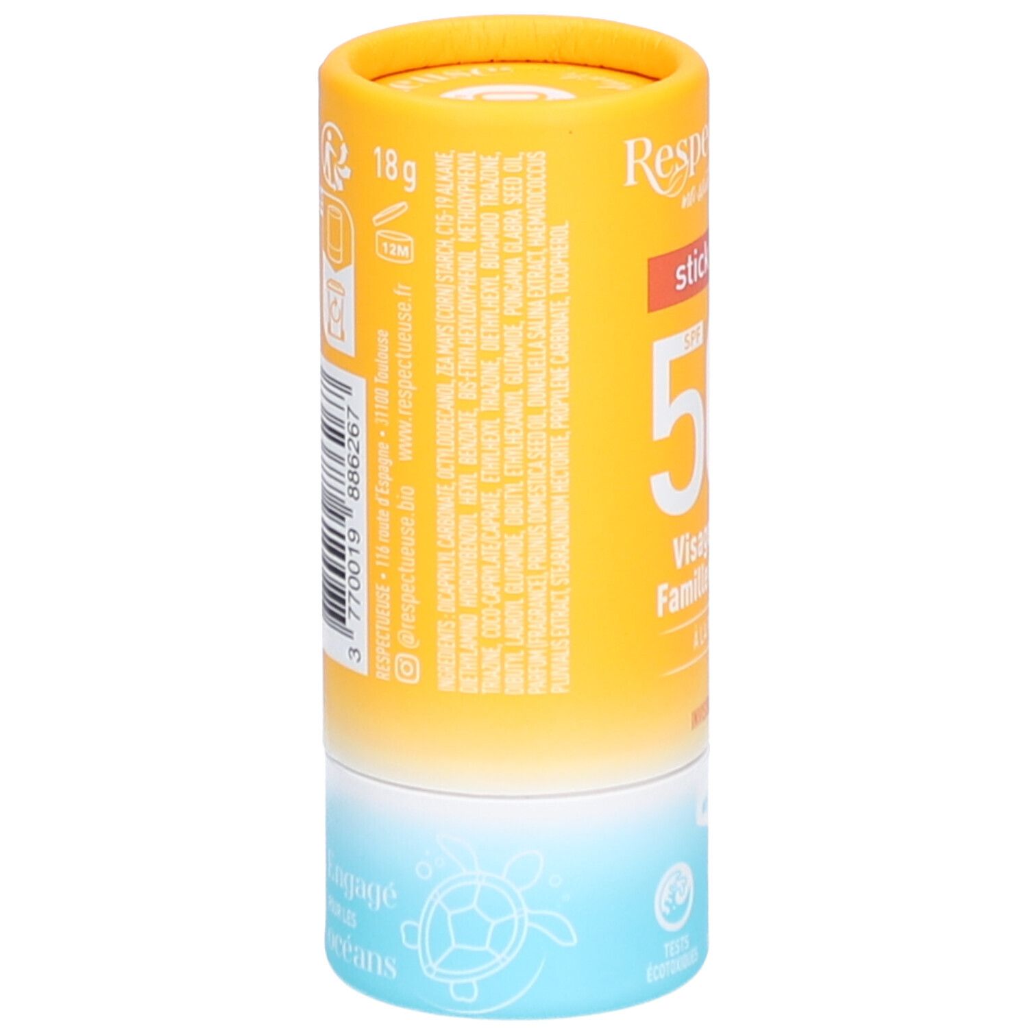 Zylindrischer Sonnencreme-Stick. Gelb-orangefarbene Verpackung mit Produktinformationen und Inhaltsstoffen. 18g. Mit Informationen zur Herstellung.