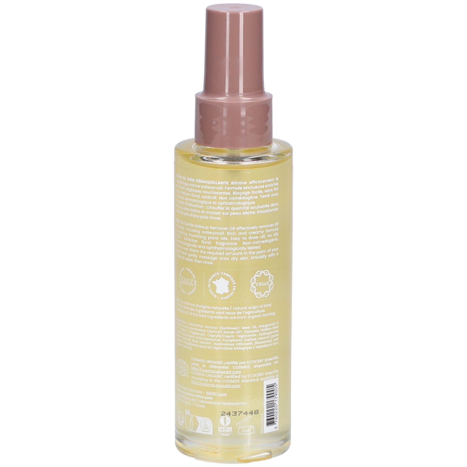 Dos d'un flacon spray d'huile. Texte sur l'étiquette. Certification bio et autres logos.