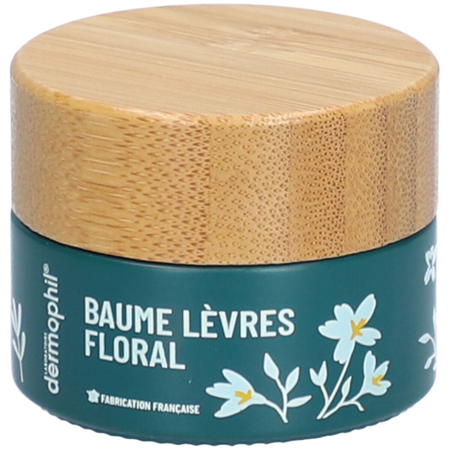 Dunkelgrüner Tiegel mit Holzdeckel. Aufschrift: BAUME LÈVRES FLORAL. Weiße Blumenmuster. Marke: dermophil.